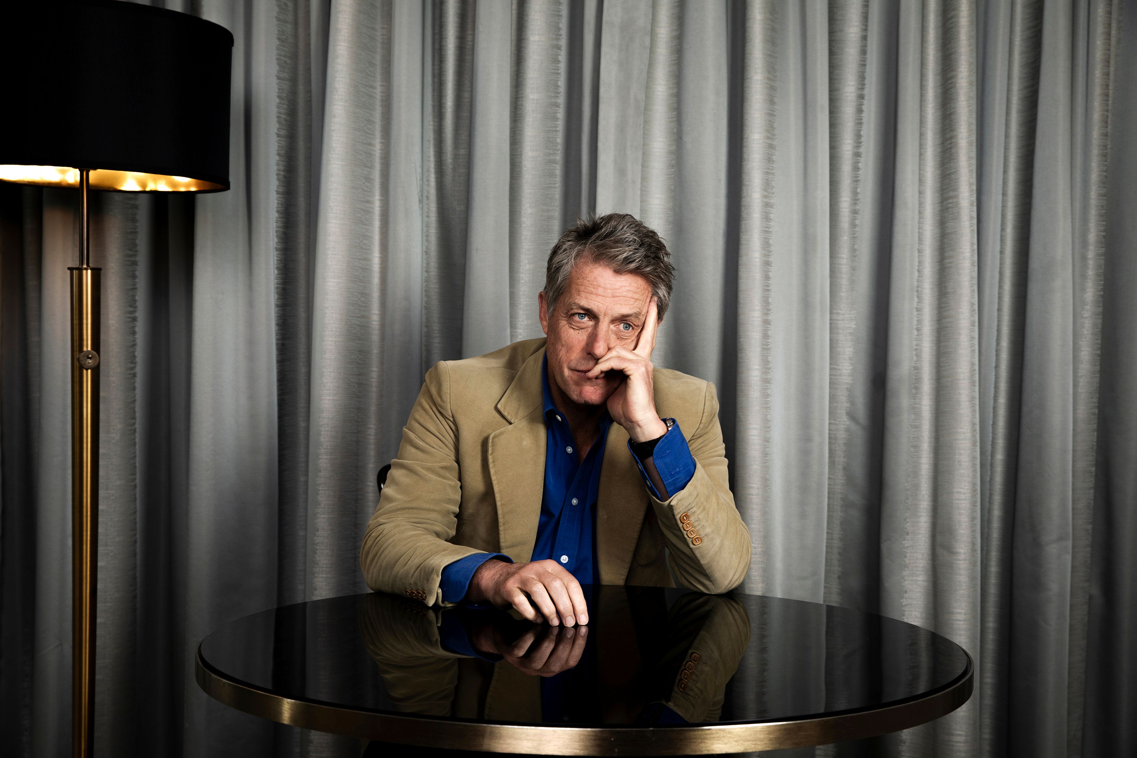 FILE - Hugh Grant poses for a portrait to promote the film "Heretic," Oct. 27, 2024, in Los Angeles. (Photo by Rebecca Cabage/Invision/AP, File)