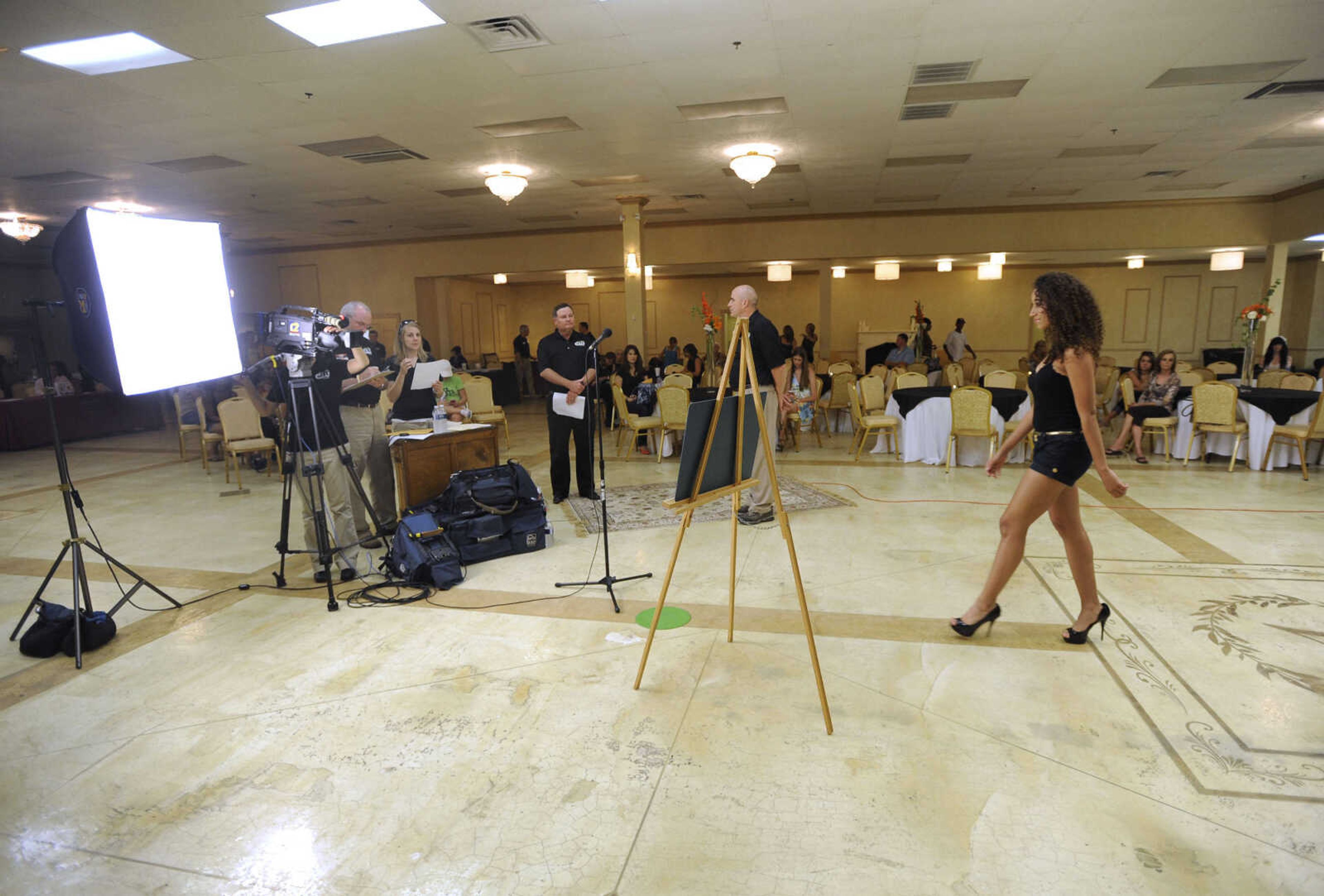 FRED LYNCH ~ flynch@semissourian.com
Victoria Wright walks toward the camera during her audition for America's Next Top Model at a casting call held by the Heartland CW on Tuesday, July 12, 2011 at The Venue.