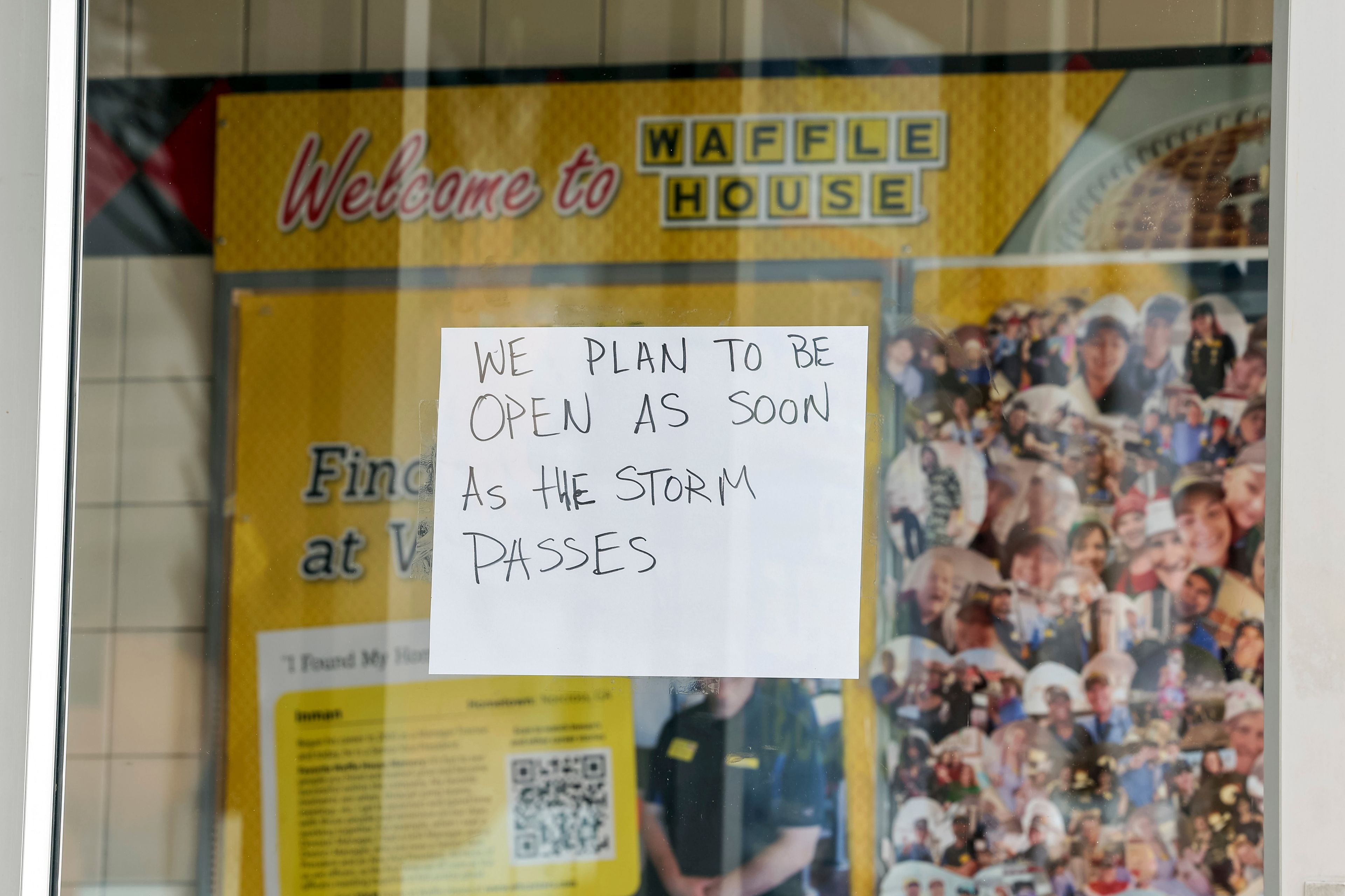 A sign on a closed Waffle House on Highway US 19 in anticipation of Hurricane Milton on Tuesday, Oct. 8, 2024, in New Port Richey, Fla. (AP Photo/Mike Carlson)