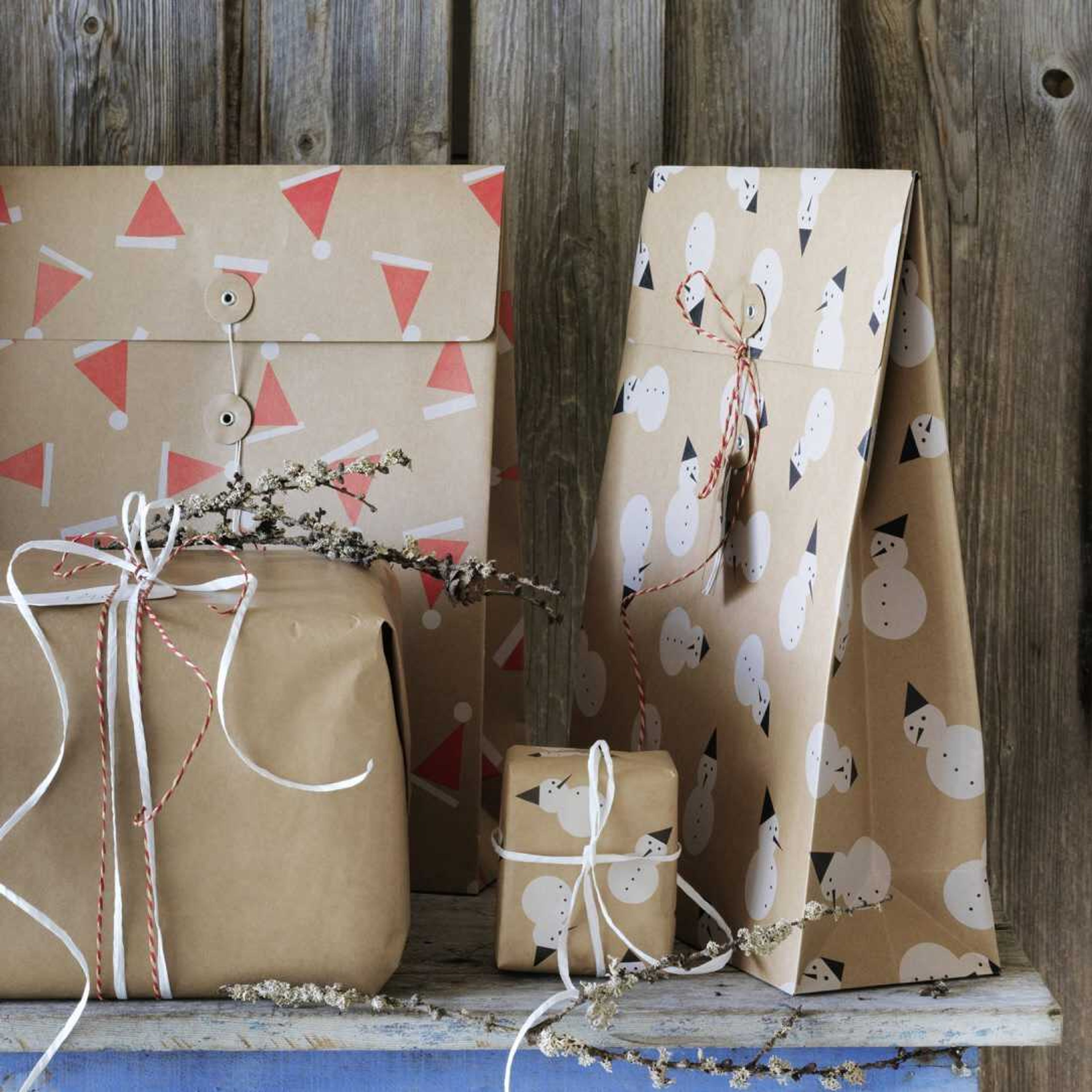 This photo shows Ikea's Vinter Gift Bags. The tins are a good alternative to traditional gift wrapping.