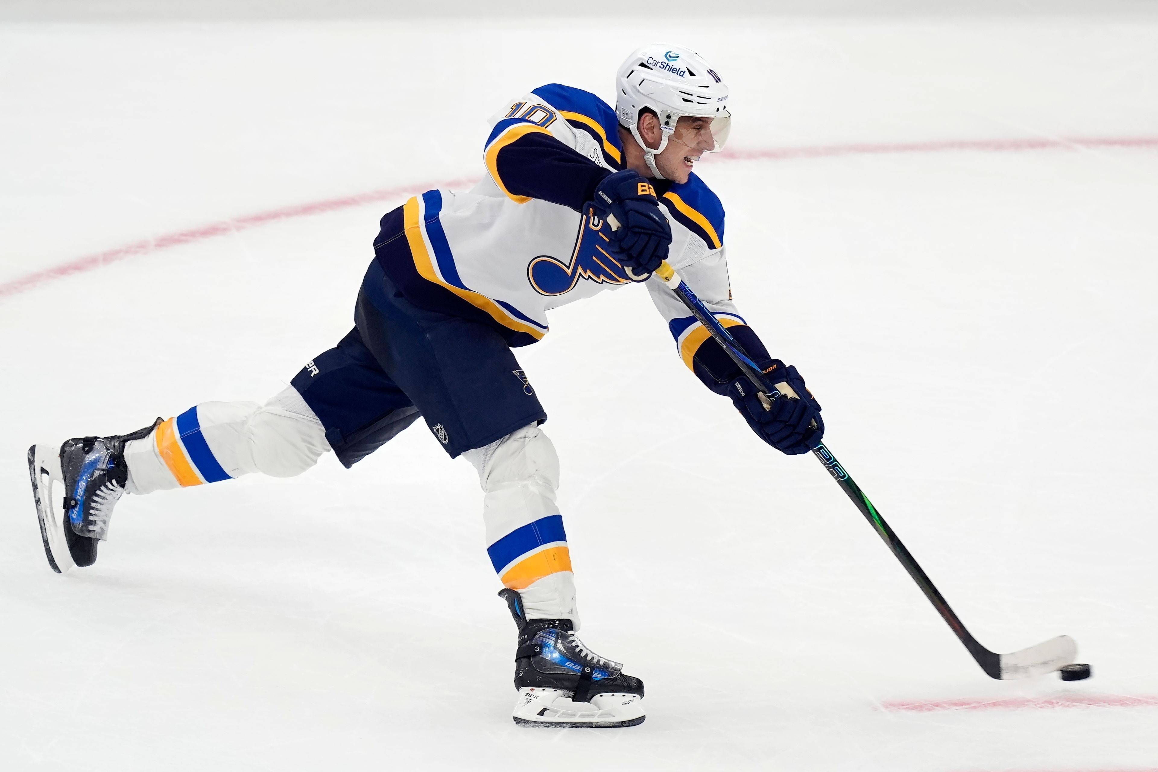 St. Louis Blues' Brayden Schenn scores the game-winning goal during overtime in an NHL hockey game against the Boston Bruins, Saturday, Nov. 16, 2024, in Boston. (AP Photo/Michael Dwyer)