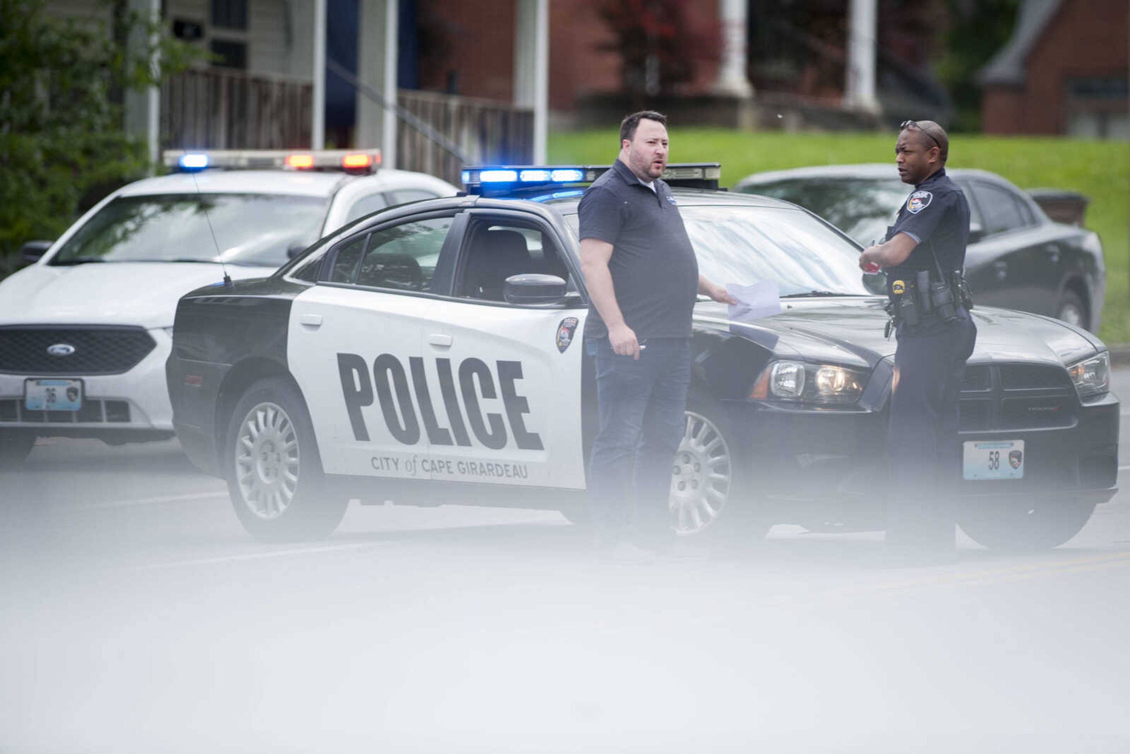 Members of the Cape Girardeau Police Department respond to the scene of a crash near the intersection of William Street and West End Boulevard on Thursday, May 14, 2020. According to Cape Girardeau police Sgt. Joey Hann, both drivers engaged in a verbal altercation. One of the vehicles began to leave the scene as the other driver retrieved a handgun from their vehicle and fired shots at the striking vehicle as it left the scene, Hann stated.