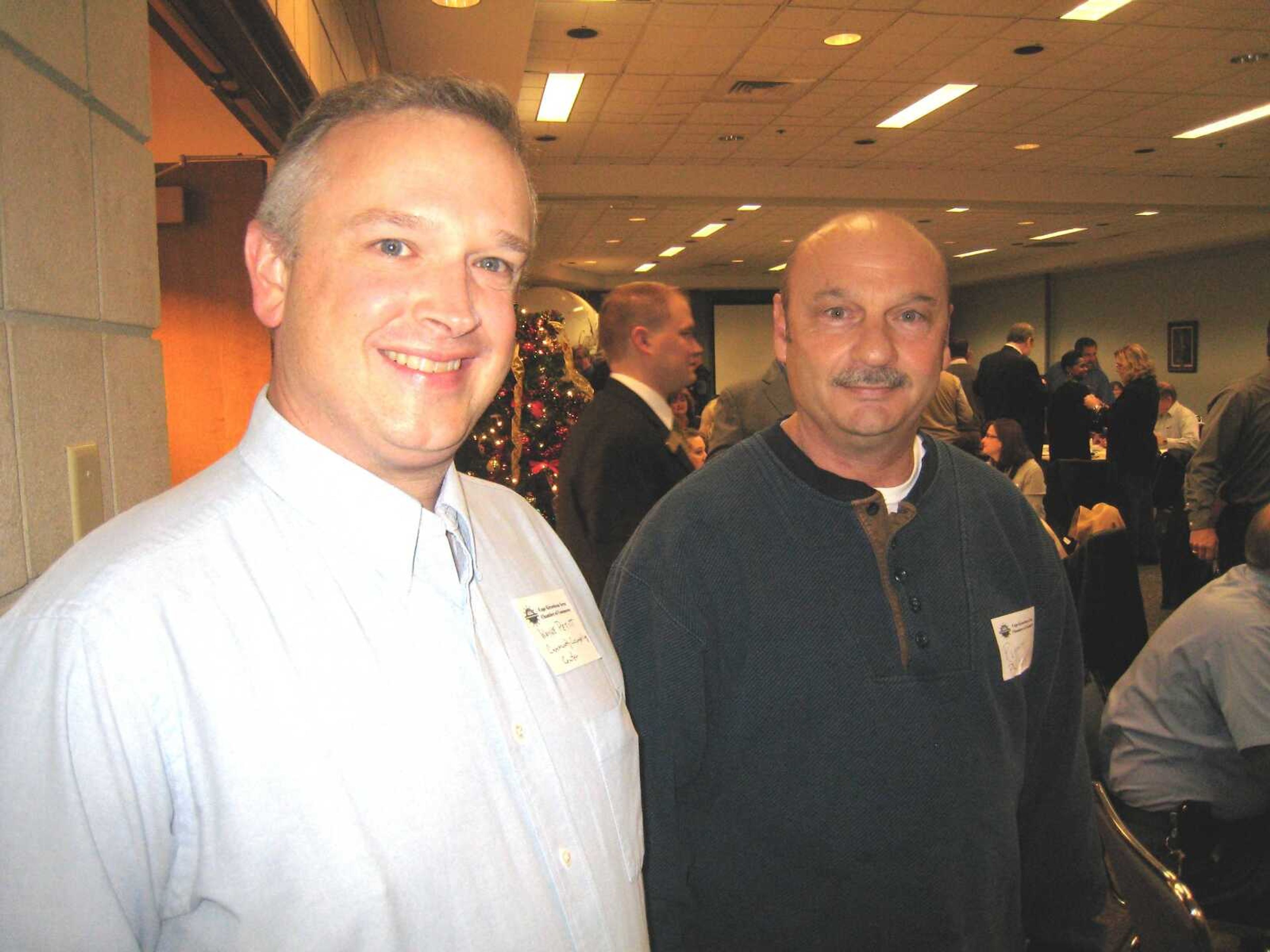 Wayne Petitt, Community Counseling Center, and Ronnie Phillips, Community Counseling Center at the Cape Girardeau Area Chamber of Commerce First Friday Coffee Friday, Jan. 4, at the Show Me Center in Cape Girardeau.