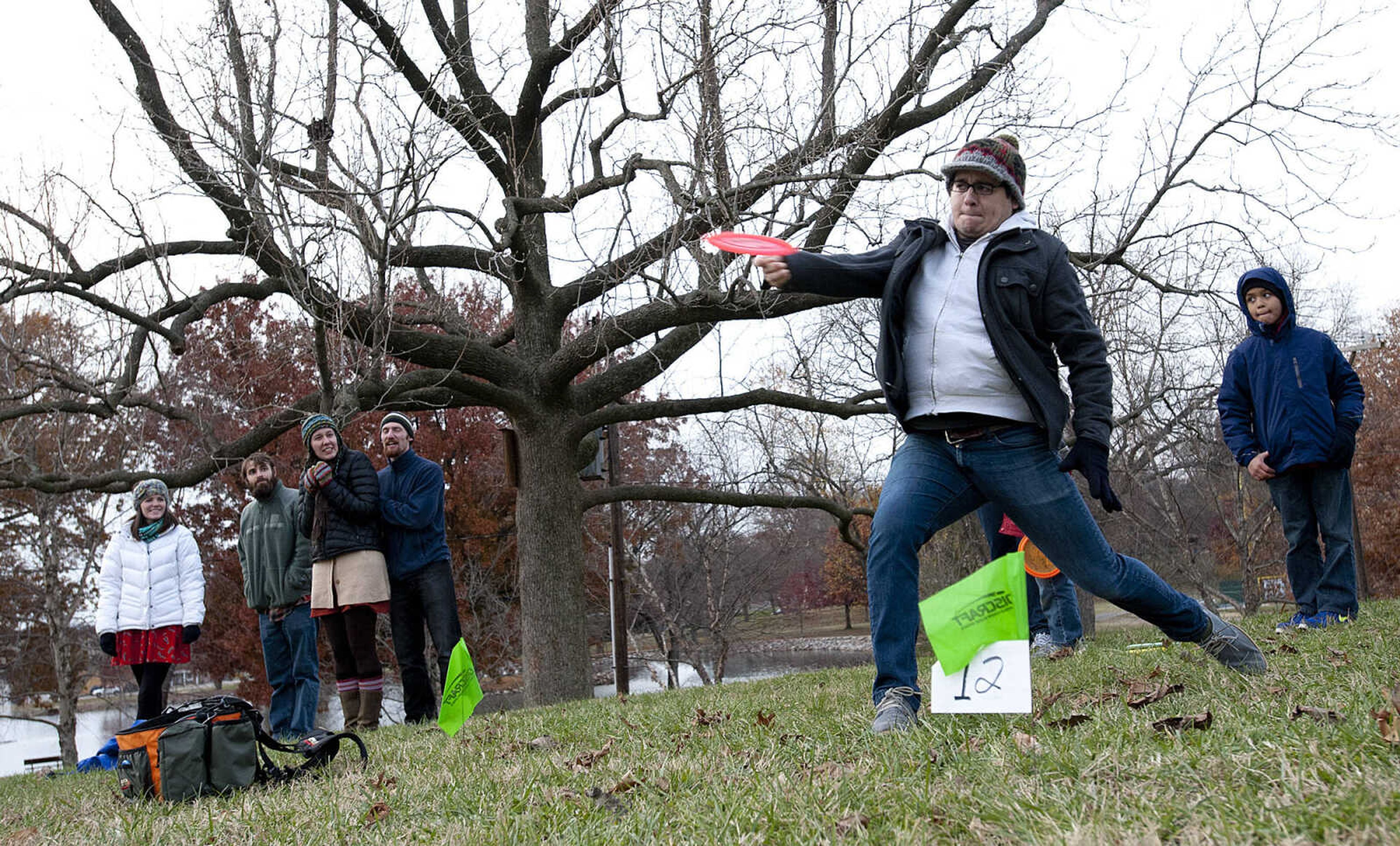 Nathan McDonald tees off during the Fountain of Life Disc Golf Tournament Sunday, Nov. 24, at Capaha Park in Cape Girardeau. Organizers estimated that approximately 30 people played in the tournament which raised around $2,500 which will go towards construction of a fresh water well for a village in Swaziland, Africa.