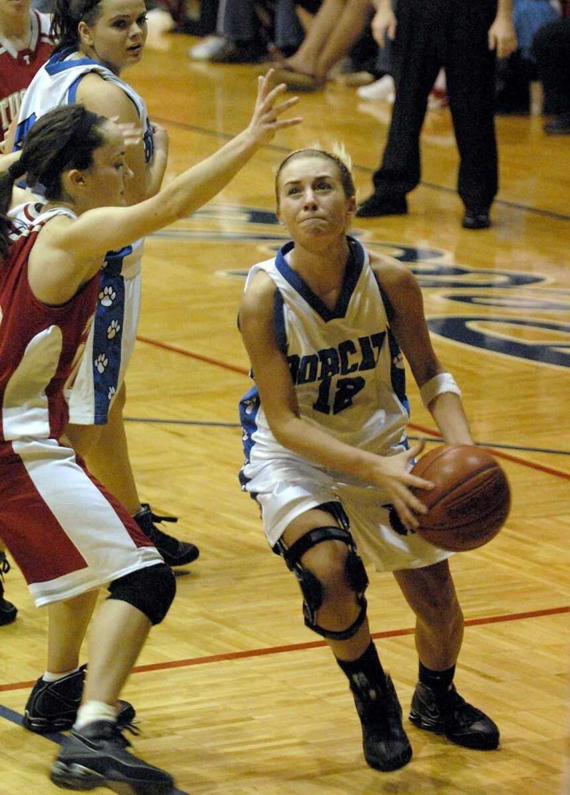 ELIZABETH DODD ~ edodd@semissourian.comDelta's Taylor Smith drives to the basket against a Tuscumbia defender during the second half. Smith finished with a team-high 16 points.