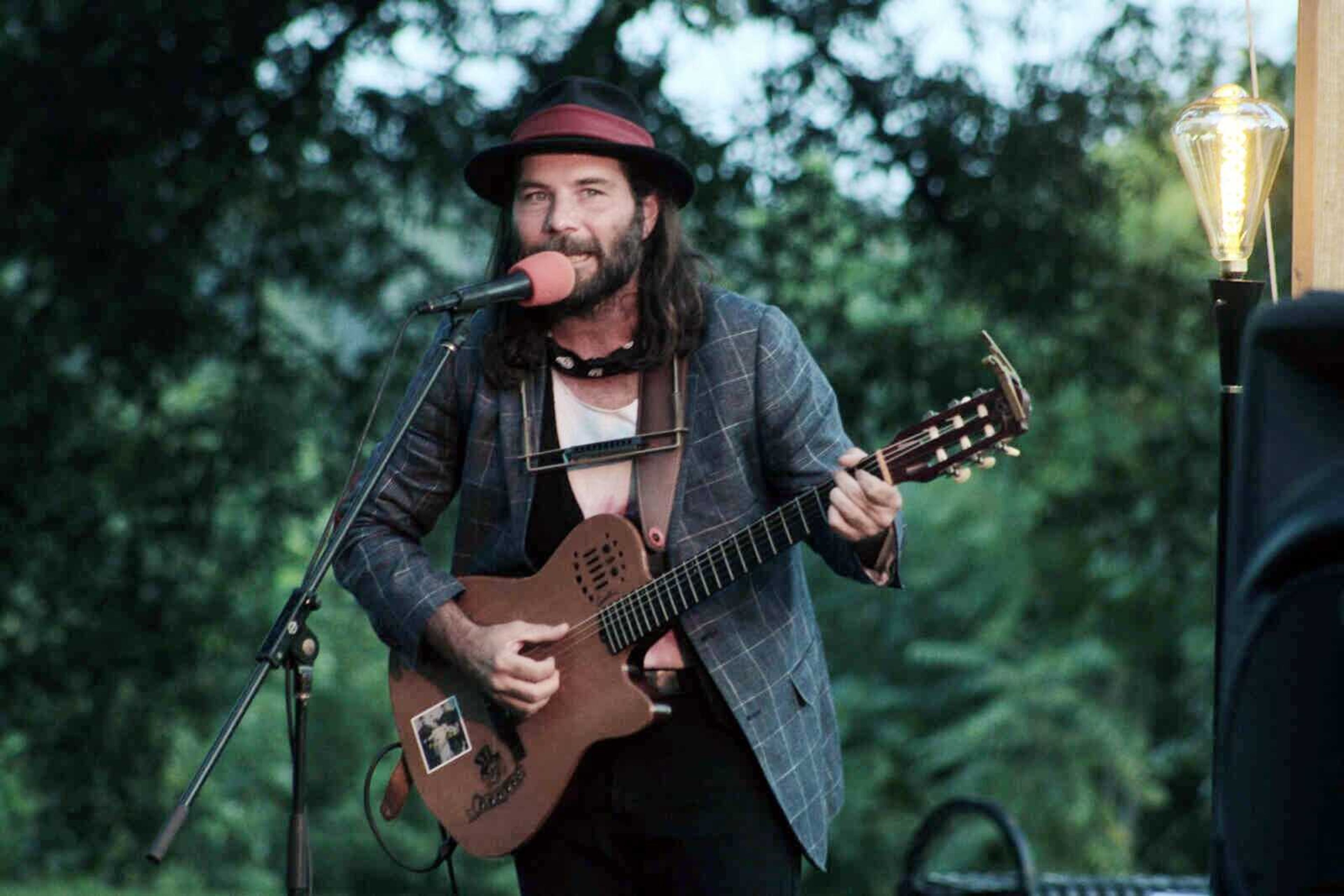 Carl Banks, a blues, roots and folk rock musician from New York City, performs during last Friday's Tunes at Twilight at River Campus Park, located at the intersection of South Spanish and Morgan Oak streets in Cape Girardeau. Old Town Cape Inc. concludes its fall concert series with a performance by Lojo Russo at 6:30 p.m. this Friday. More photos of Banks' performance can be found in a gallery at semissiourian.com.