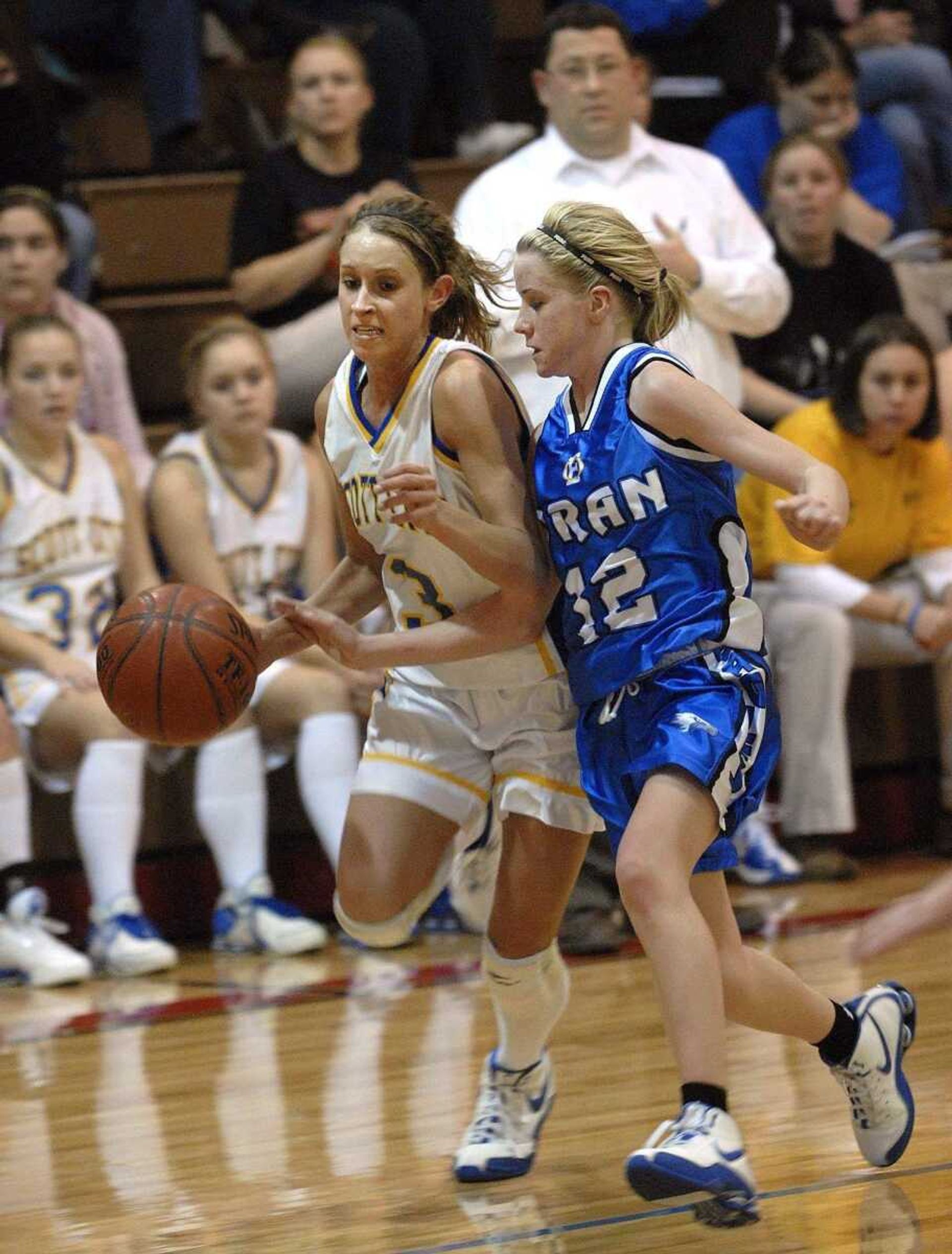 FRED LYNCH ~ flynch@semissourian.comScott City's Stephanie Essner drives against Oran's Abby Anderson in the third quarter Monday at the Chaffee Invitational.