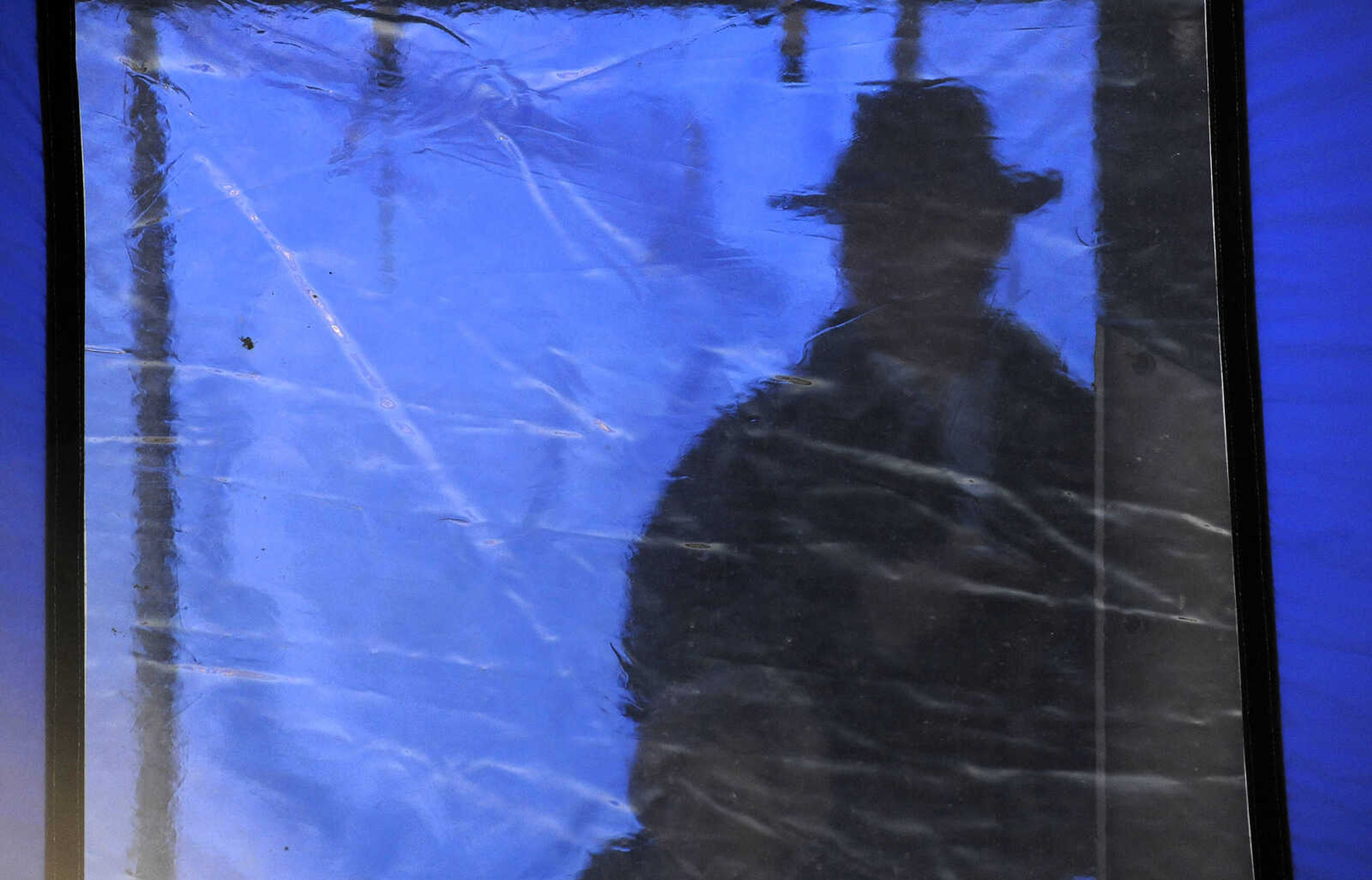 LAURA SIMON ~ lsimon@semissourian.com

A visitor waits in the warming tent as members of the Cape Girardeau Fire Department put on a demonstration to compare and test different fire suppression techniques at Drury Lodge, Thursday, Jan. 28, 2016.