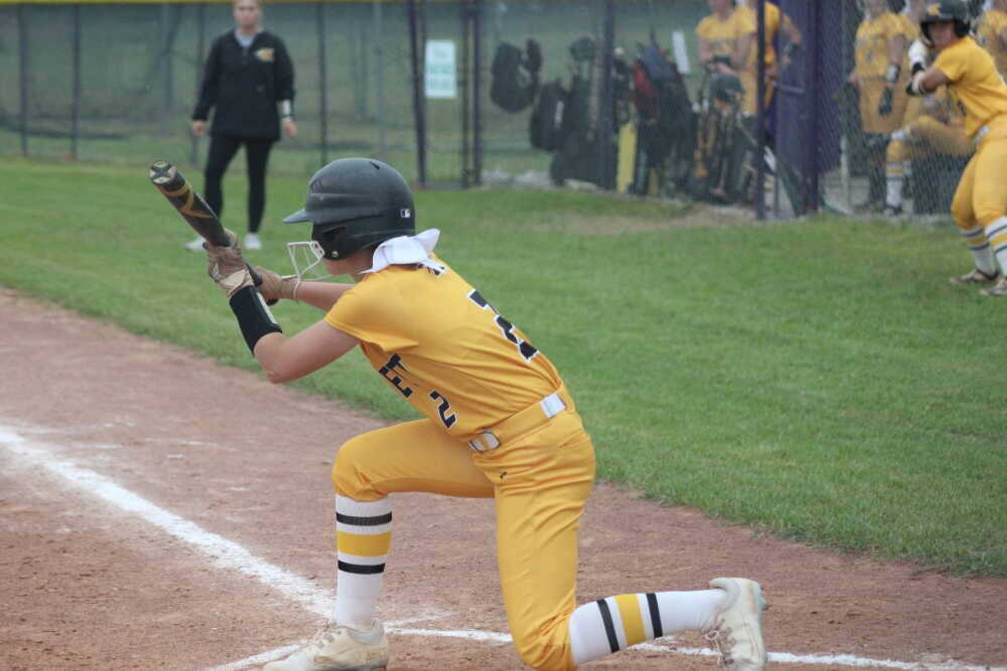 Kennett Lady Indian Lauren Barton shows bunt at a regular season game at Holcomb.
