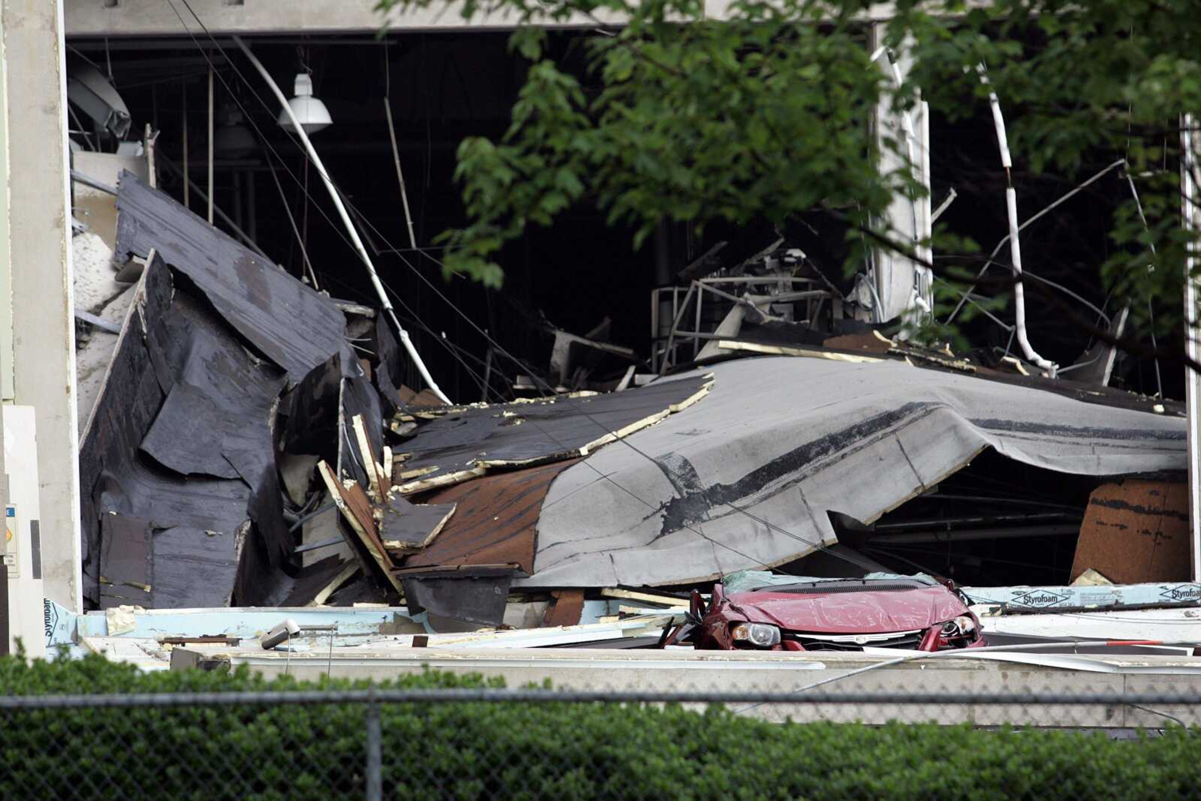 A Slim Jim plant is shown after an explosion Tuesday in Garner, N.C. Dozens of people were hurt and a toxic cloud was left behind as authorities searched for the missing. (Jim R. Bounds ~ Pool)