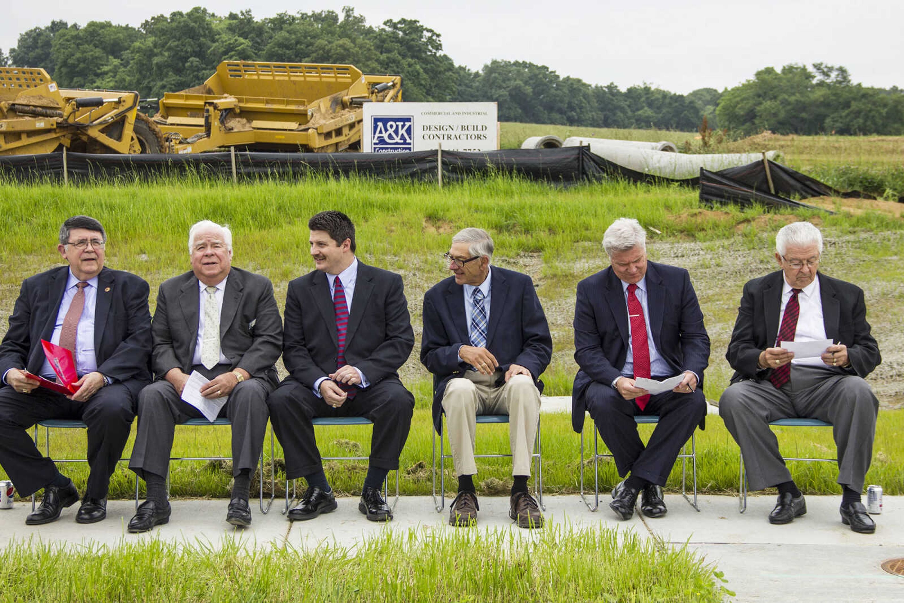 CAROL KELLISON ~ photos@semissourian.com
The panel for the ceremonial groud breaking of the Pepsi distribution plant set to be built in Cape Girardeau, prepare their speeches for the ceremony. 
Dr. Kenneth Dobbins, Harry L. Crisp II, Pastor Jim Rudolph, Reverend Sam Roethmeyer, Jason Archer, Harry Rediger