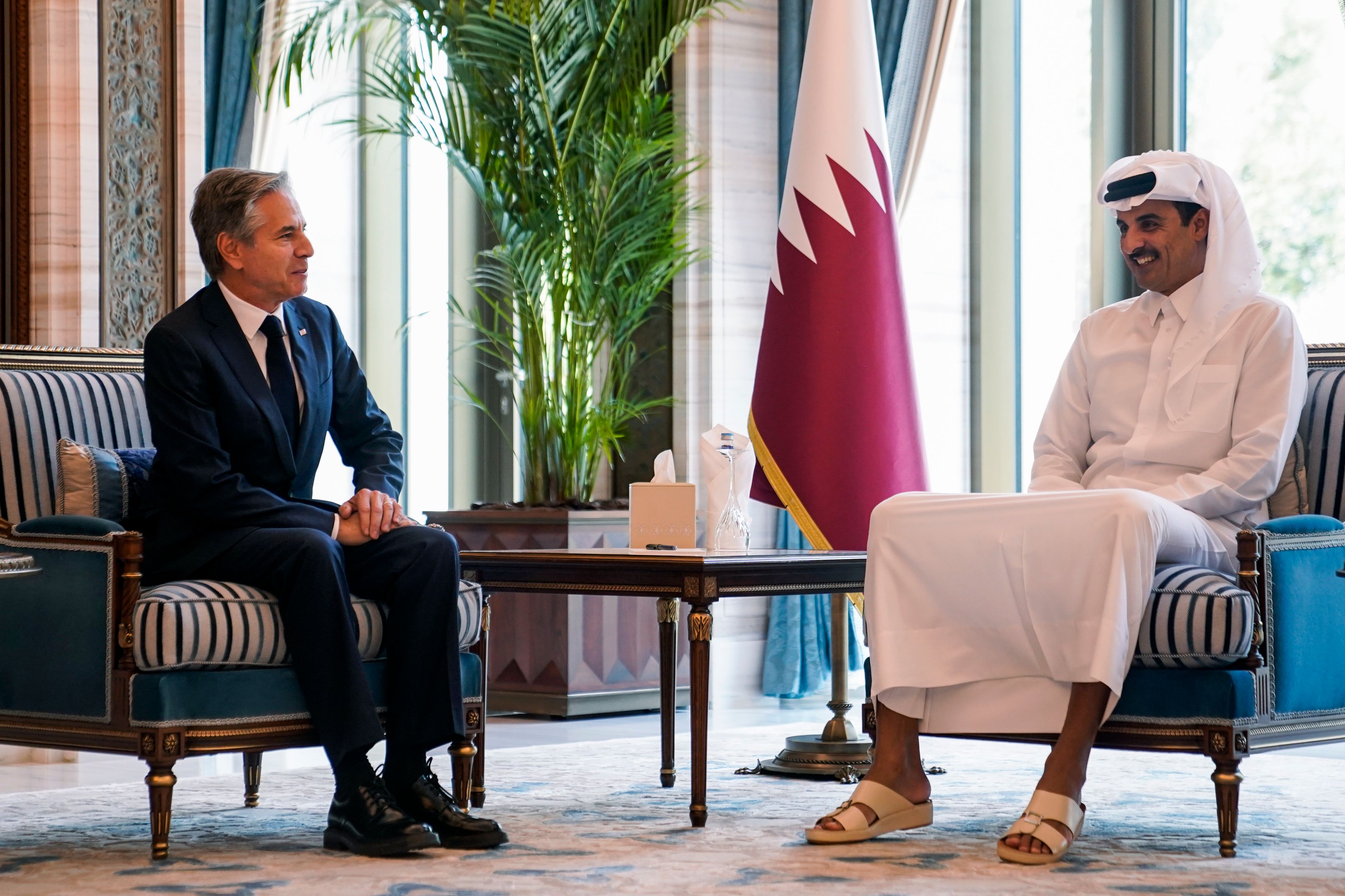 U.S. Secretary of State Antony Blinken, left, meets with Qatar's Emir Sheikh Tamim bin Hamad al-Thani in Doha, Qatar, Thursday, Oct. 24, 2024. (Nathan Howard/Pool Photo via AP)