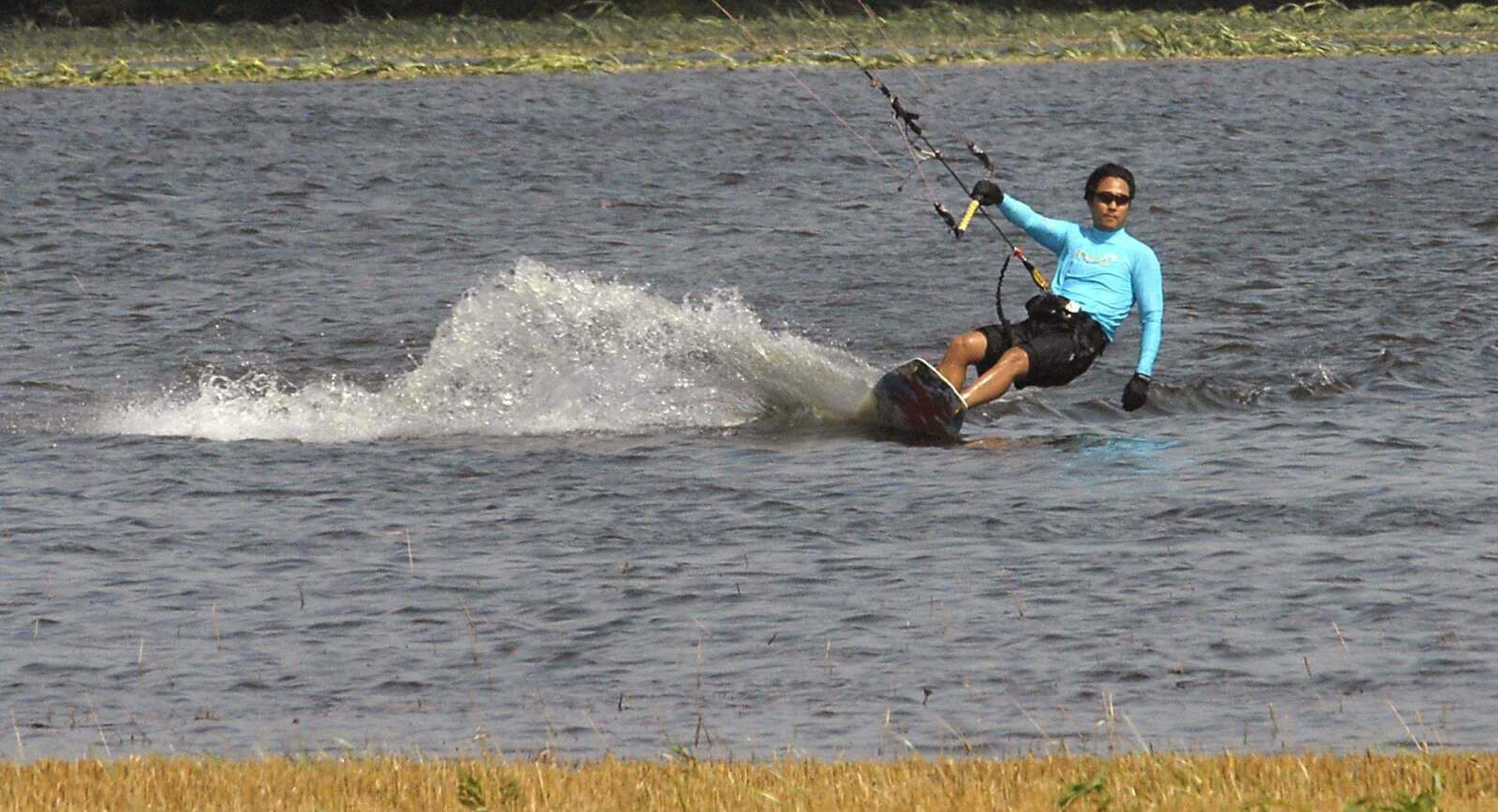 FRED LYNCH ~ flynch@semissourian.com
Dr. Kee Park brought his kiteboard in after riding it in a flooded field south of Cape Girardeau Friday.