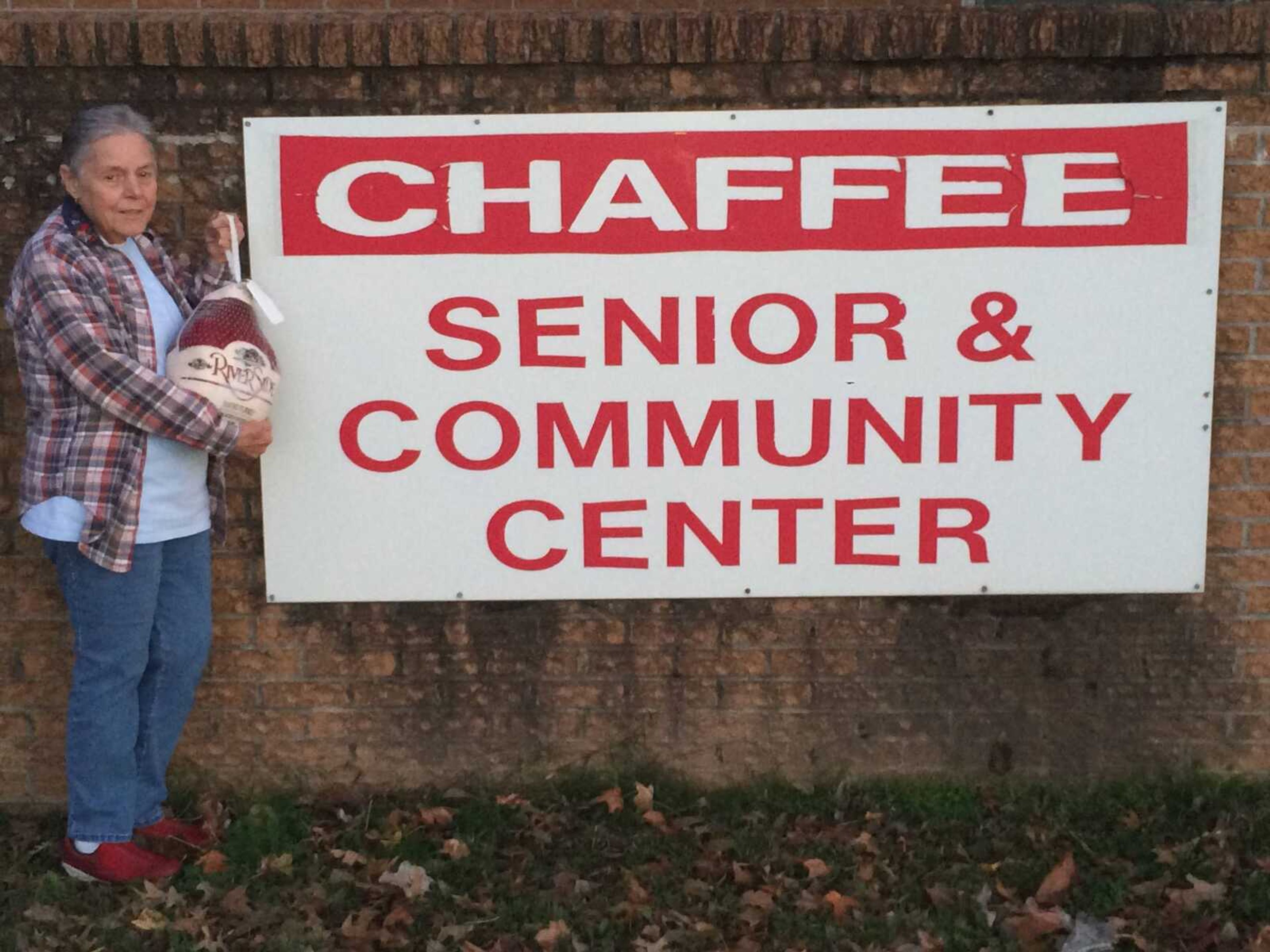 Pictured here is Sandra Whitmore who received the Turkeys on behalf of Director Susan Pobst of the Chaffee Senior and Community Center.