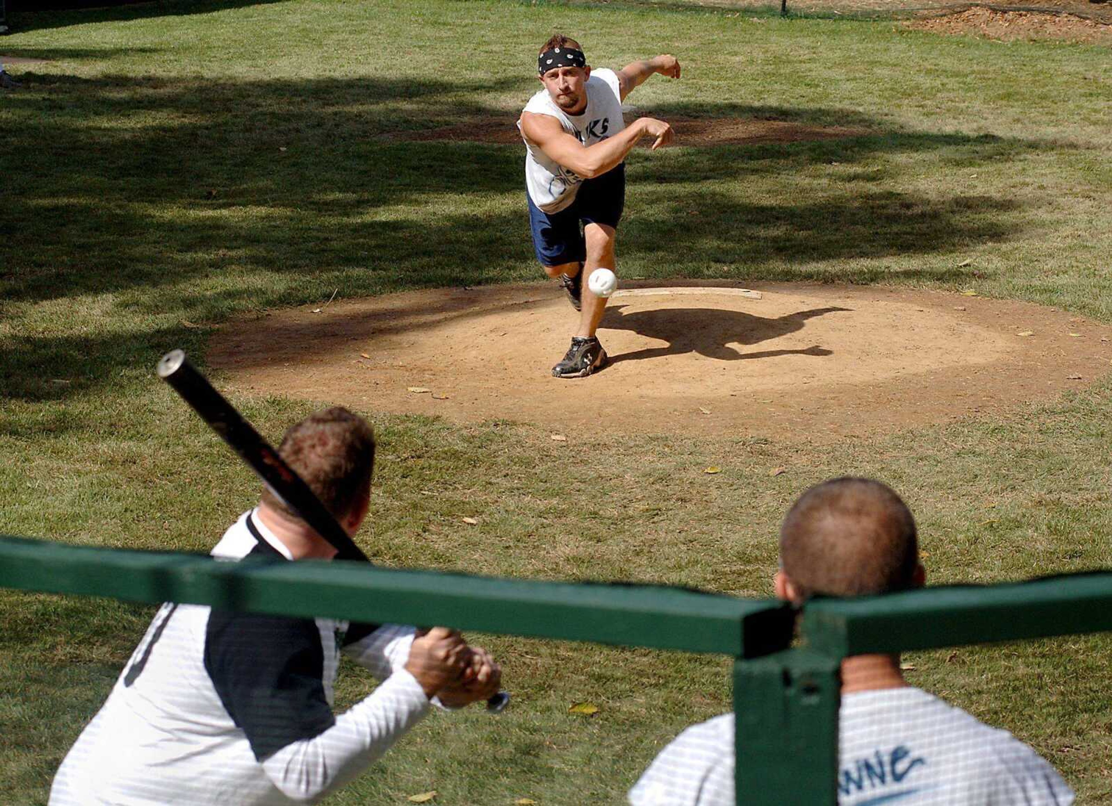 The Holiks' Tommy Waun pitches to a batter from of the Gurken Salad team during the semifinals of the 13th annual multistate wiffleball tournament Sunday. The Holiks came from Parsons, Kan., to play in the tournament.LAURA SIMON photos@semissourian.com