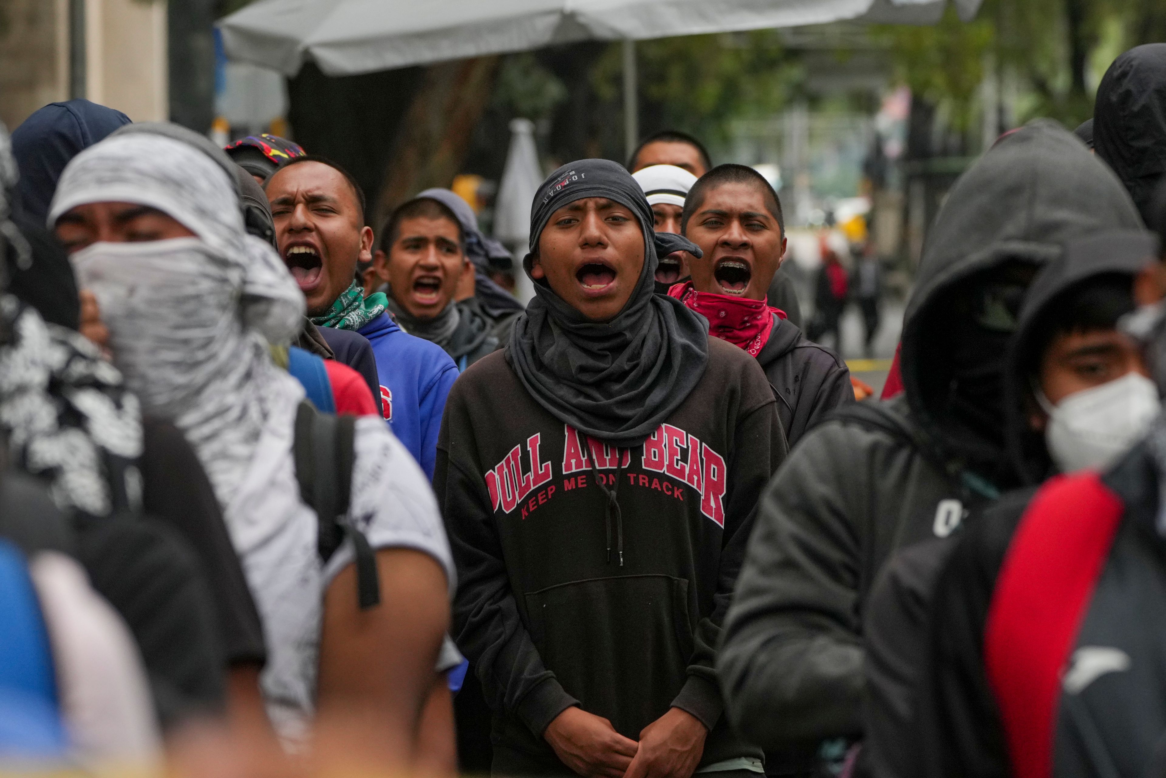 Students demonstrate ahead of the 10th anniversary of the disappearance of 43 Ayotzinapa students in Guerrero state, outside of the Senate in Mexico City, Tuesday, Sept. 24, 2024. (AP Photo/Fernando Llano)