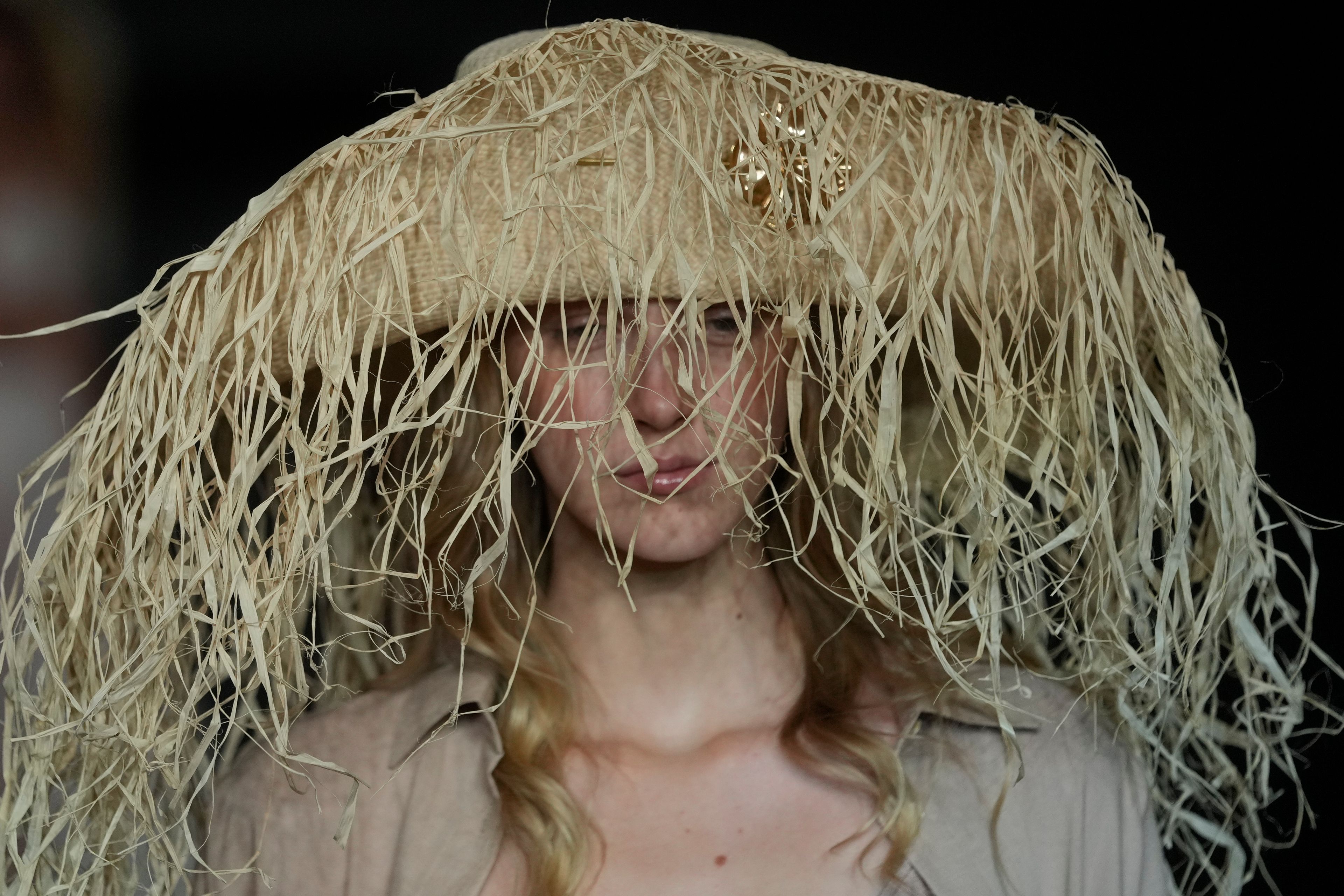 A model wears a creation from the Salinas collection during Sao Paulo Fashion Week in Sao Paulo, Brazil, Thursday, Oct. 17, 2024. (AP Photo/Andre Penner)