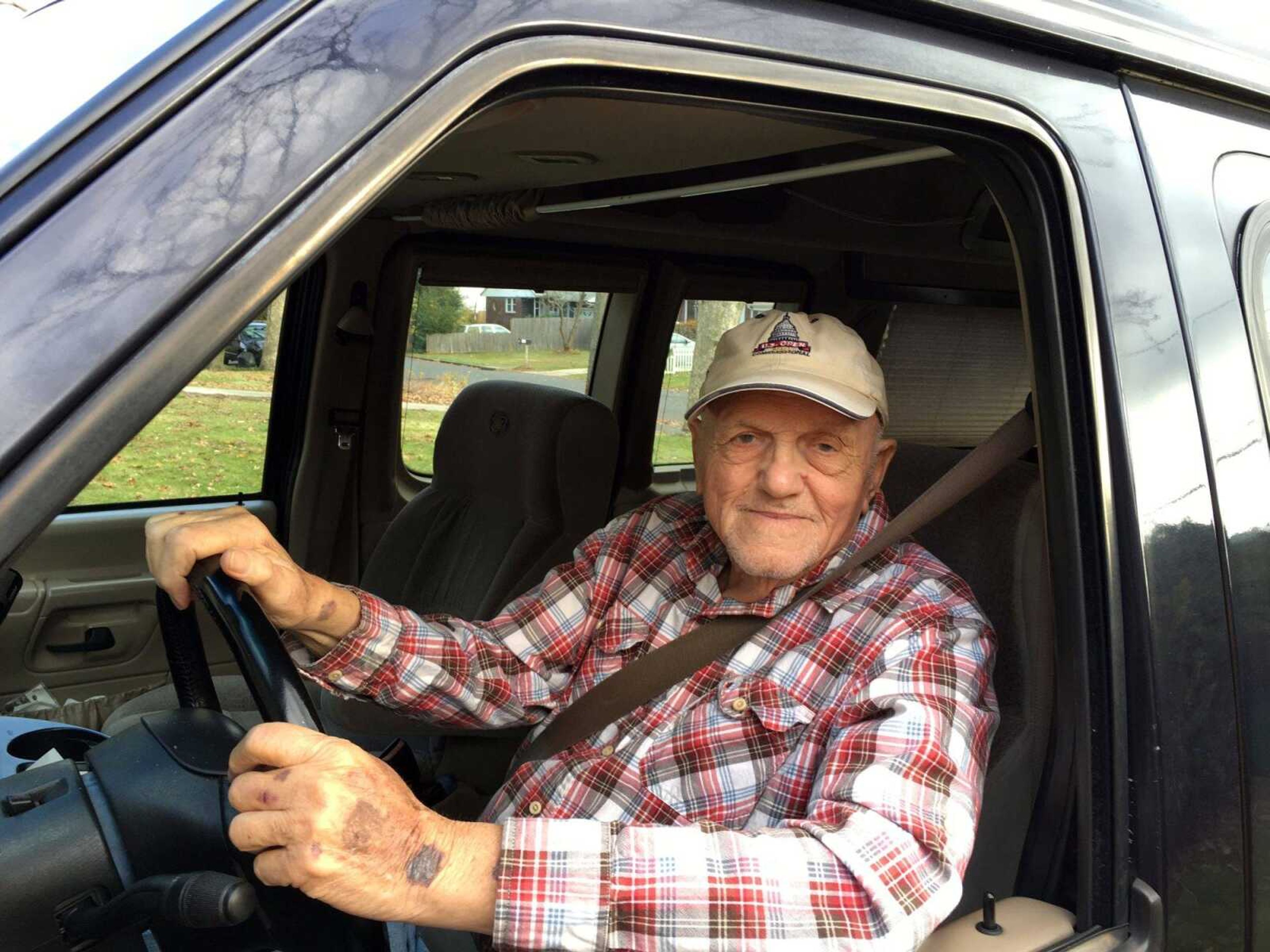 This photo provided by Jerome Minerva shows his father, Joe Minerva, 86, seated in his Ford E150 conversion van, who recently took an AARP driving class in Huntington, New York. The class was very helpful for the elder driver, even for someone who's been driving for almost 70 years. (Jerome Minerva via AP)