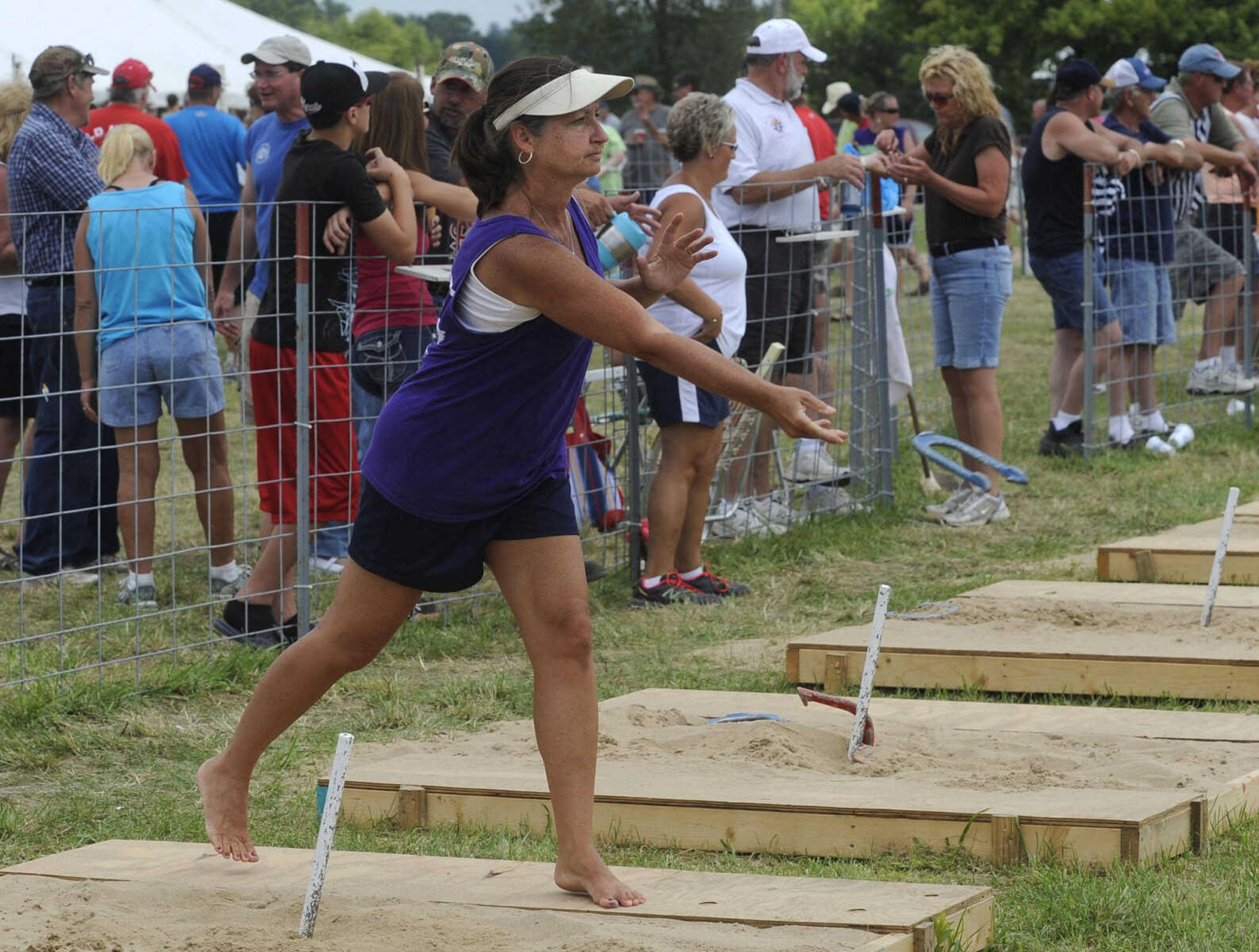 Lori Fohey of Hannibal, Mo. pitches a horseshoe at the 33rd annual Knights of Columbus State Horseshoe Tournament in Jackson.