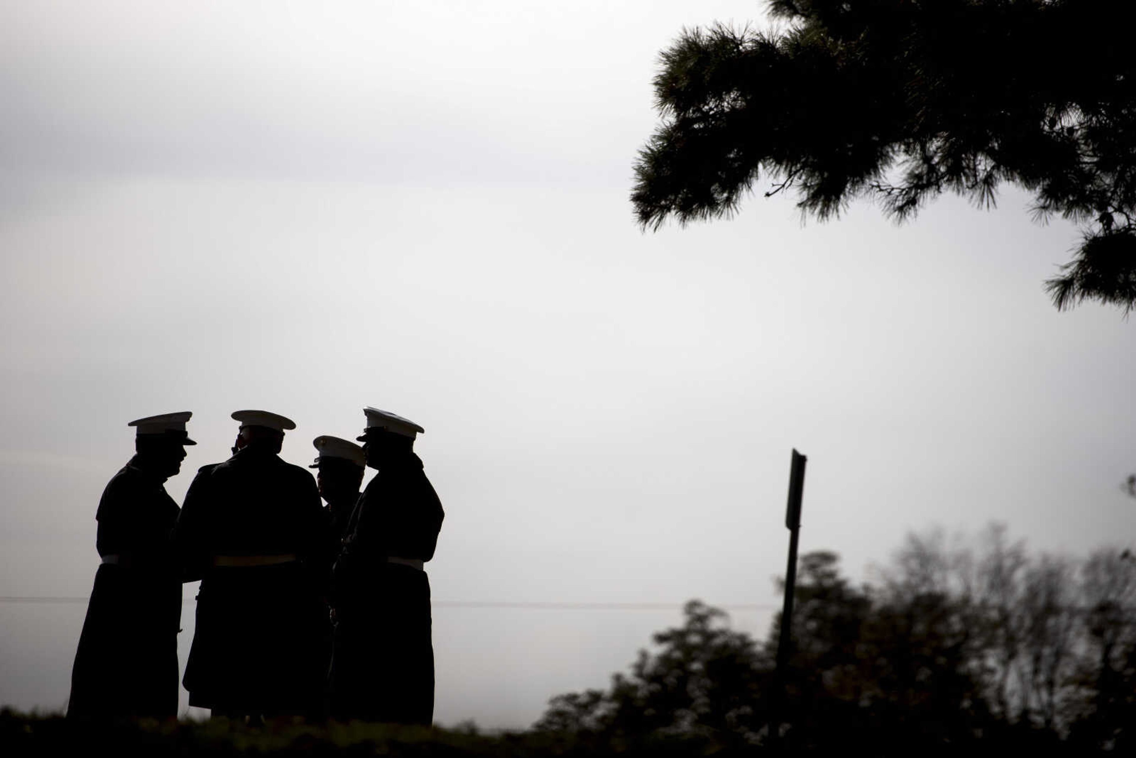 The Marine Corps League Detachment 1081 wait before a Veterans Day ceremony at Freedom Corner Saturday, Nov. 11, 2017 in Capaha Park.