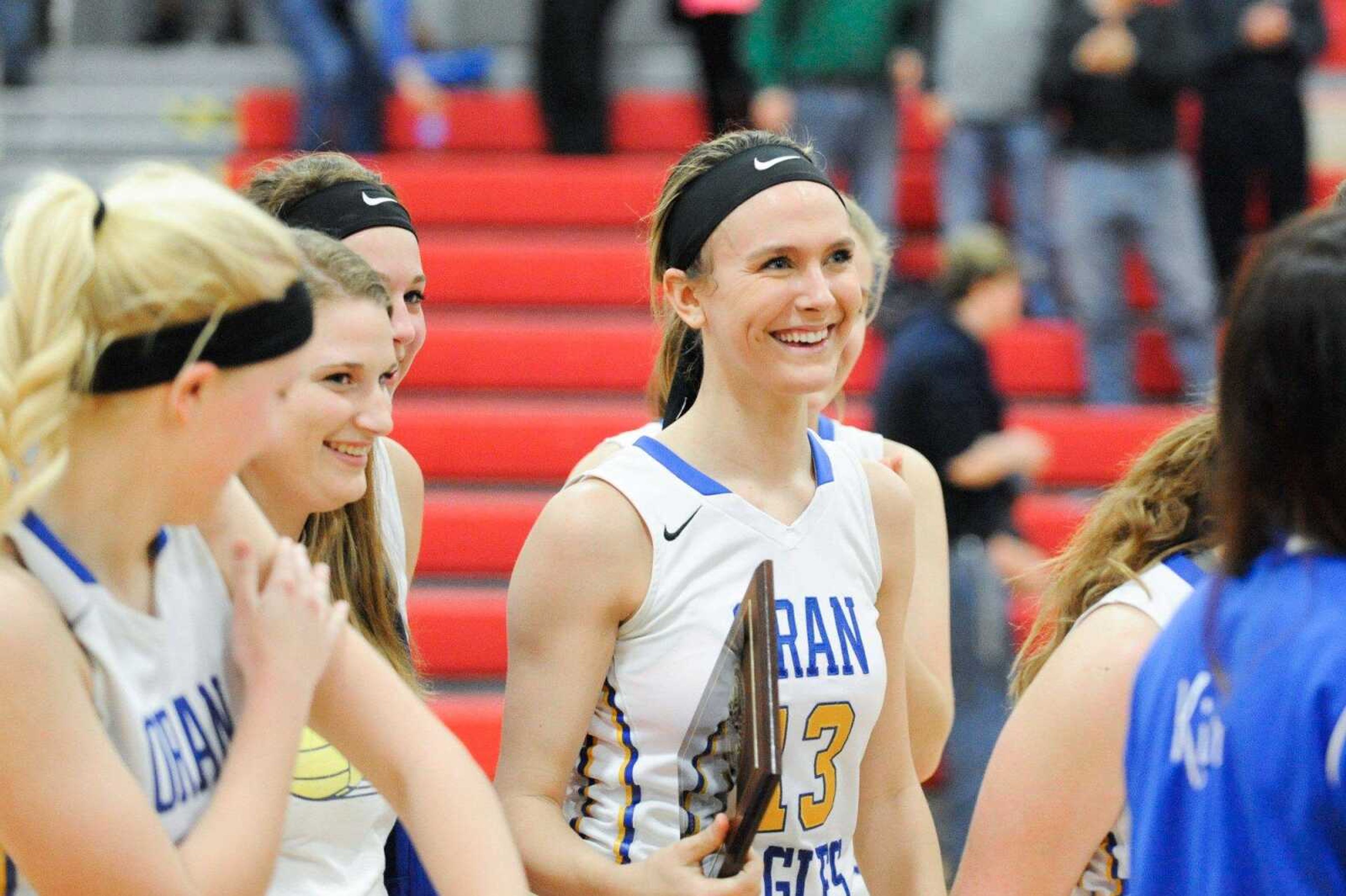 Oran's Tatum May, center, and her teammates celebrate after defeating Scott County Central in the championship game of the Scott-Mississippi Conference Tournament on Thursday in Chaffee, Missouri. (Glenn Landberg)