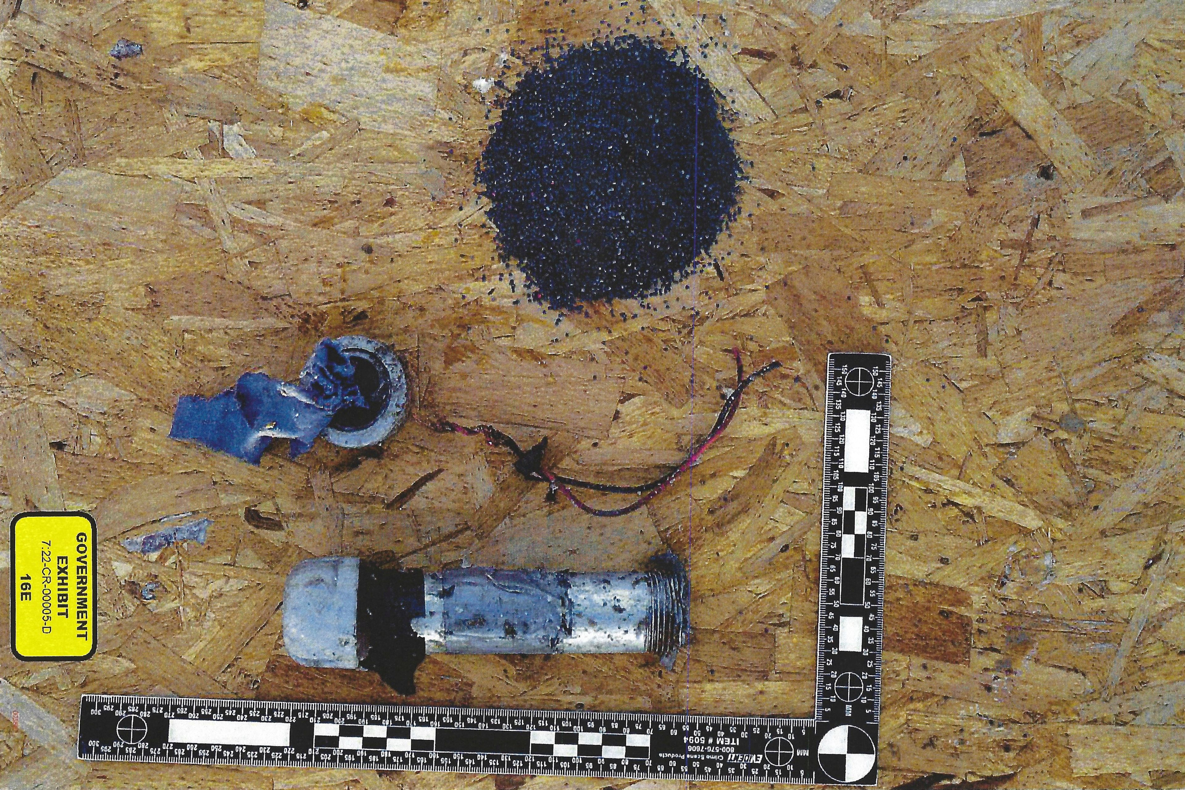 This image used as evidence shows parts of an improvised bomb which federal prosecutors say was found at Chris Arthur's home in Mount Olive, N.C. (U.S. District Court for the Eastern District of North Carolina via AP)