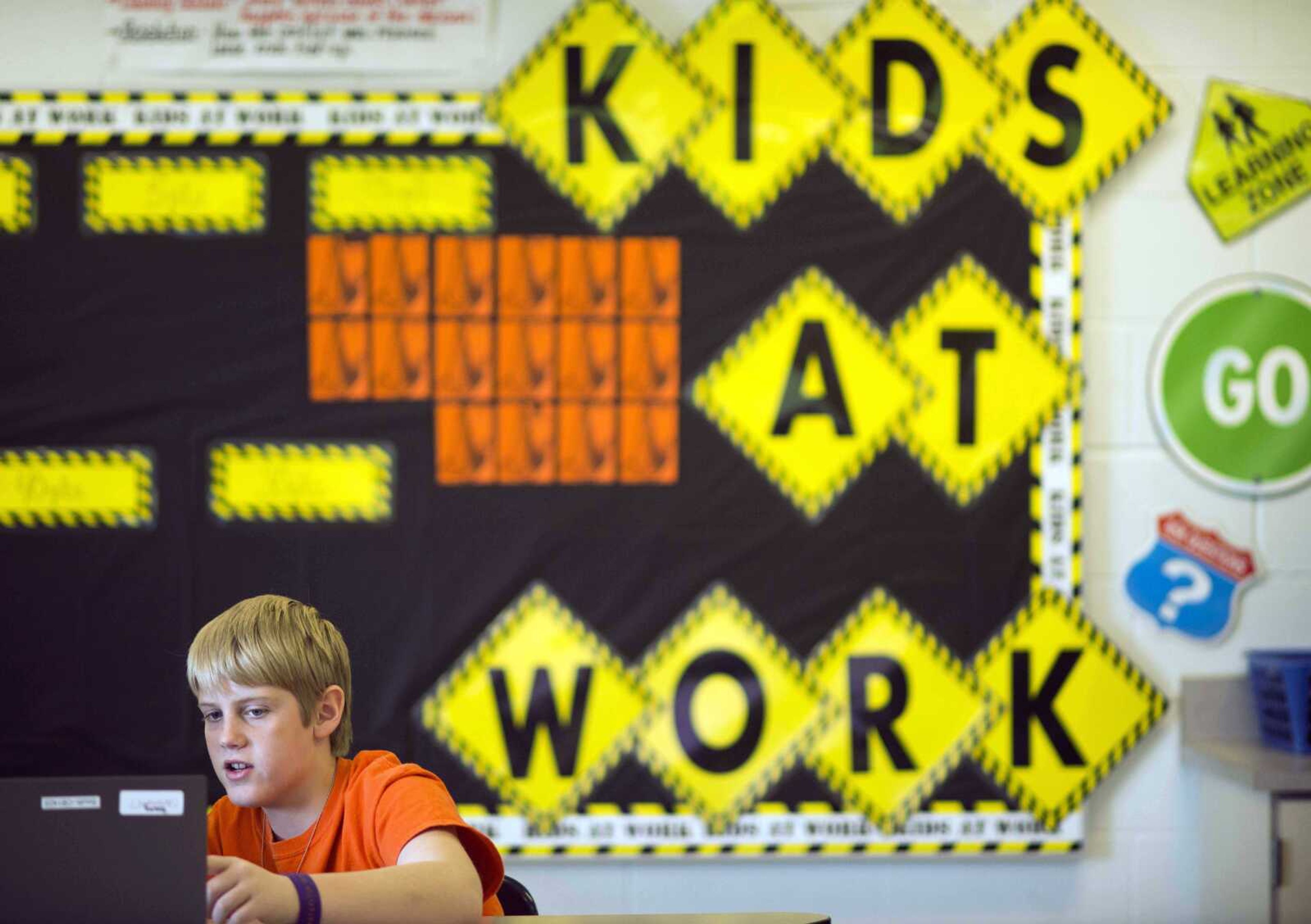 Sixth-grader Alex Greuey, 11, reads through a problem in the English language arts section of the Partnership for Assessment of Readiness for College and Careers test as he and his classmates practice for the Common Core State Standards Exams at Morgan Elementary School South in Stockport, Ohio. Today, Ohio becomes the first state to administer one of two tests in English language arts and math based on the Common Core standards developed by two groups of states. (Ty Wright ~ Associated Press)