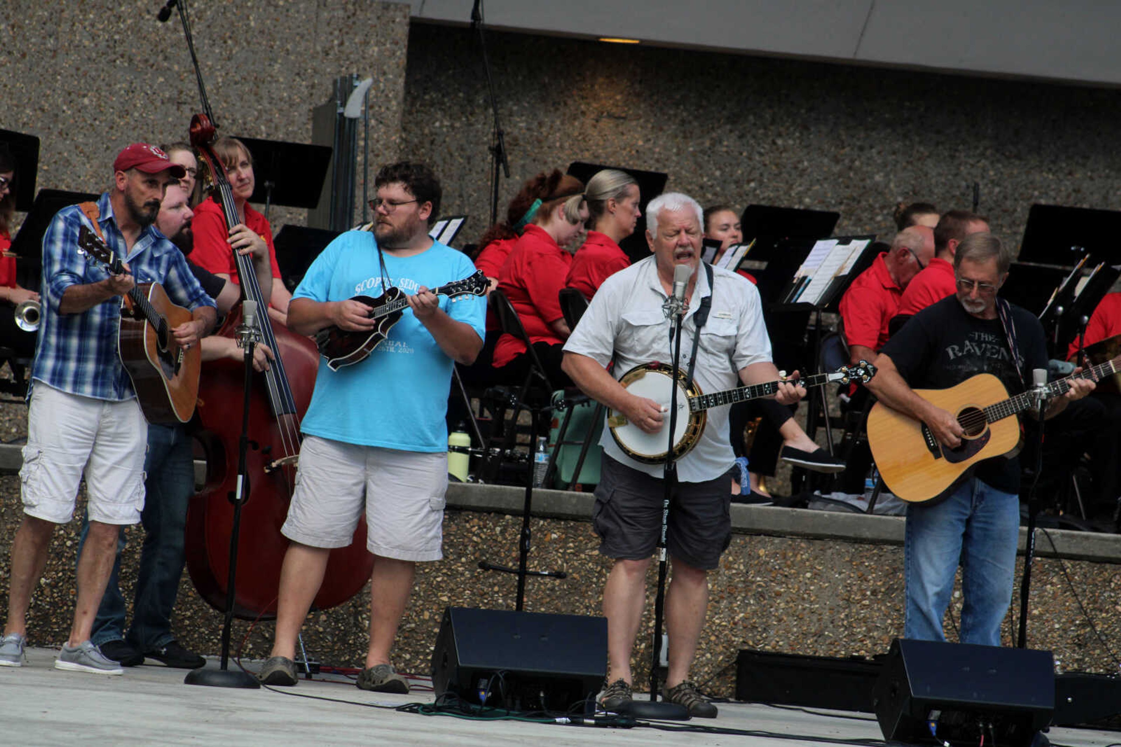 The Whitewater Bluegrass Band performs at the Nick Leist Memorial Bandshell in Jackson City Park on Thursday, July 15, 2021, in Jackson.