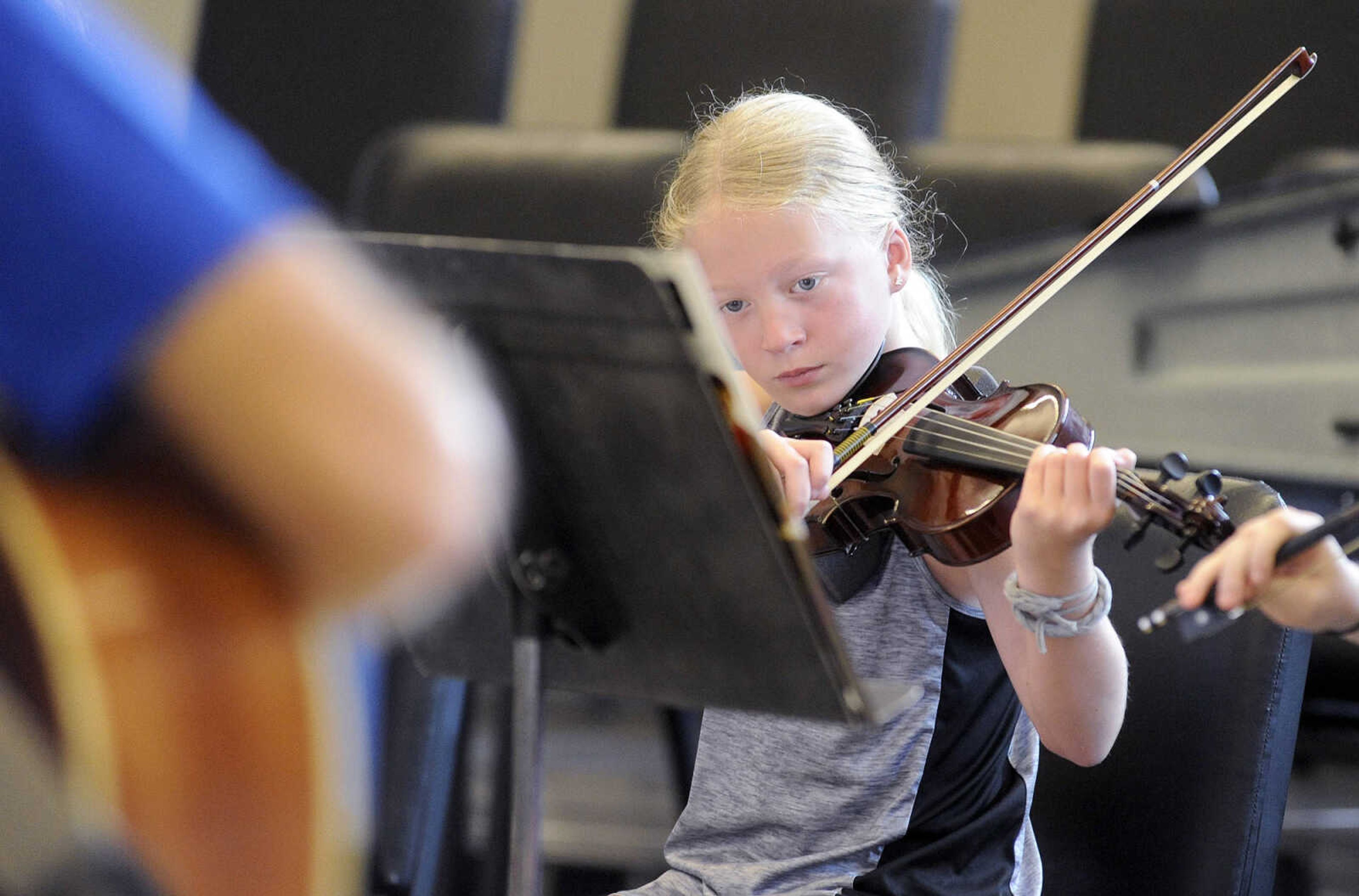 LAURA SIMON ~ lsimon@semissourian.com

Kami Eubank plays her fiddle along with the other seven students in the Southeast Missouri State University Music Academy's Exploring American Fiddle Styles class taught by Steve Schaffner at the River Campus on Wednesday, July 20, 2016.