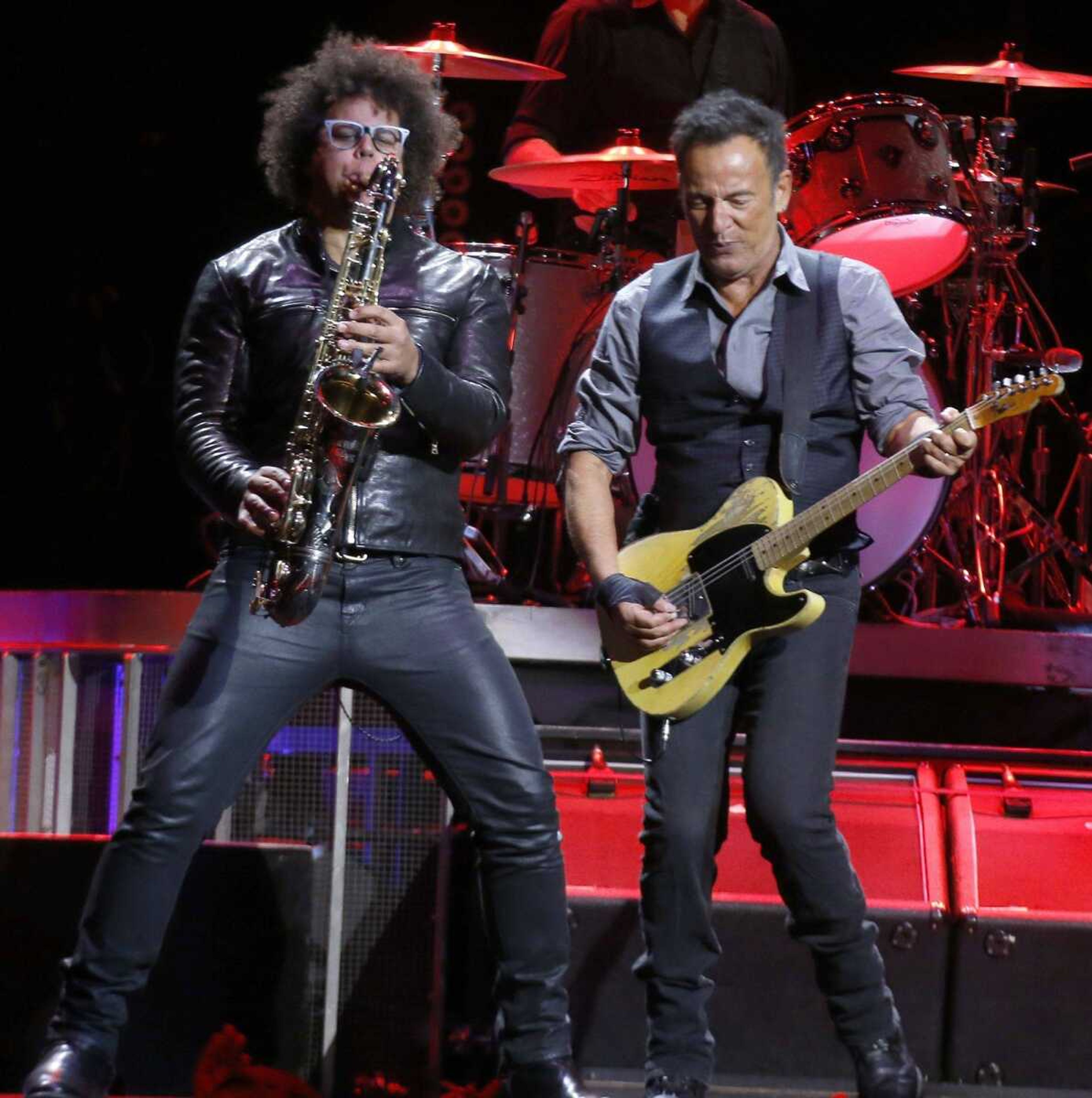 Bruce Springsteen, right, performs with Kake Clemons and the rest of the E Street Band in the first stop of his River Tour 16 concert Saturday in Pittsburgh.