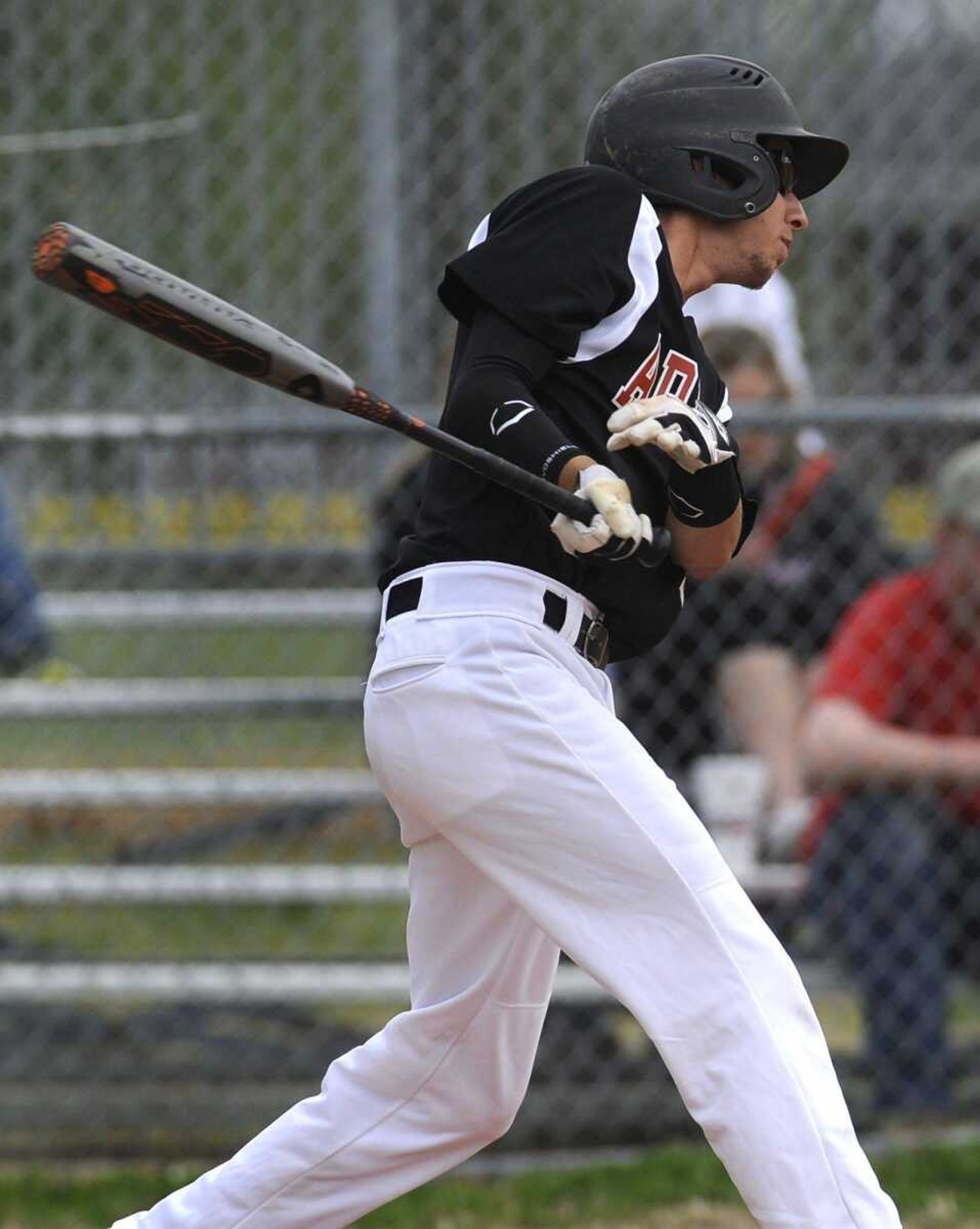 Advance&#8217;s Zane Eggimann doubles in two runs against Woodland during the third inning Monday in Advance, Mo. (Fred Lynch)