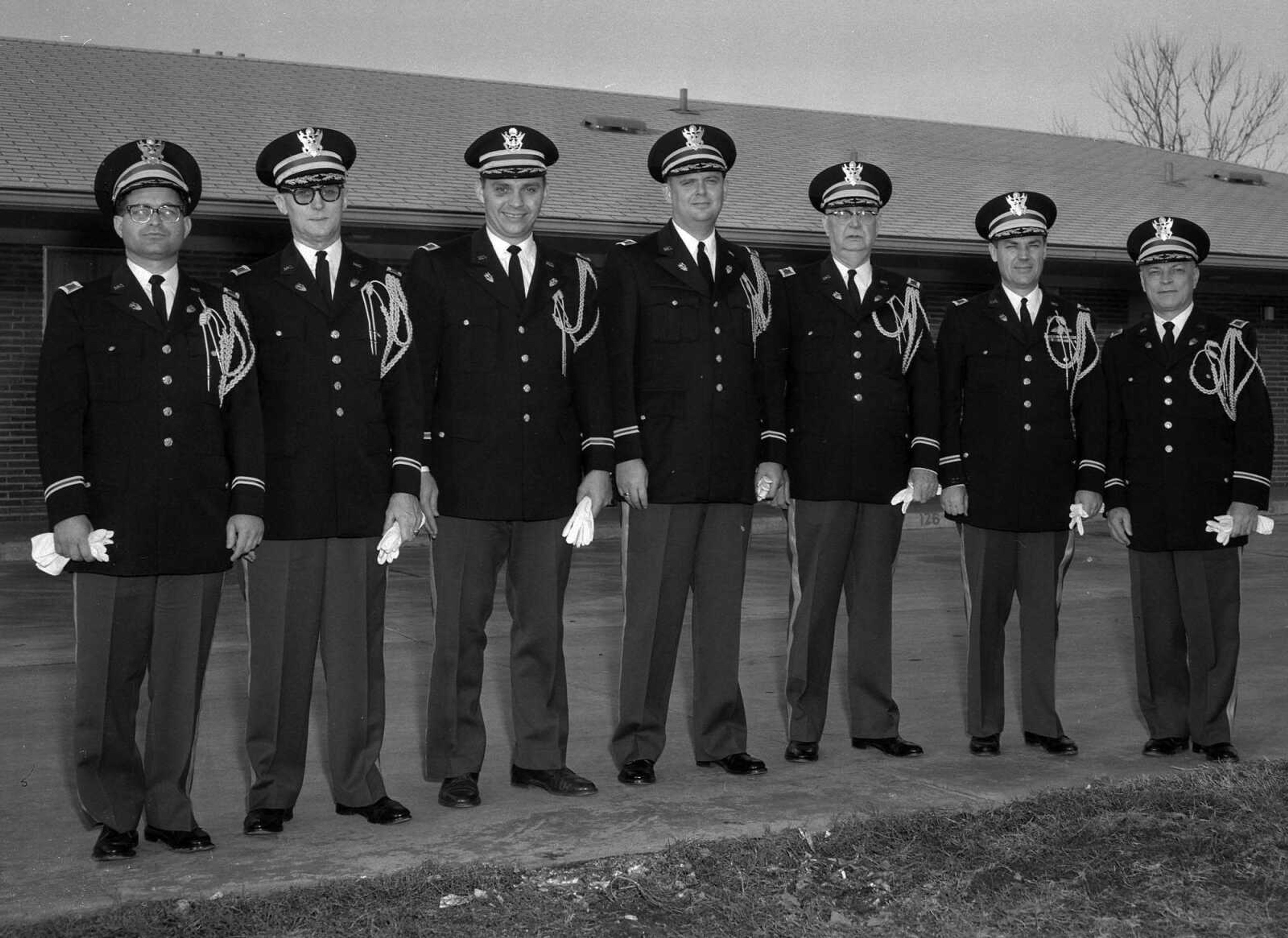 In 1960, Missouri Governor-elect John Dalton picked a number of men from Southeast Missouri to serve on his honorary colonels staff, including Dr. Harold O. Grauel on the far right. Marvin Proffer is third from the left. Can you identify the others? Mike Masterson replied: "In the colonels' photo, the second man from the left, standing next to Marvin Proffer, is R.A. Fulenwider from Jackson, who owned Fulenwider Drug." Gerald Johnson added: "In the center is Paul Williams of First Federal Savings. Lawyer Jack Oliver is next to Dr. Grauel."