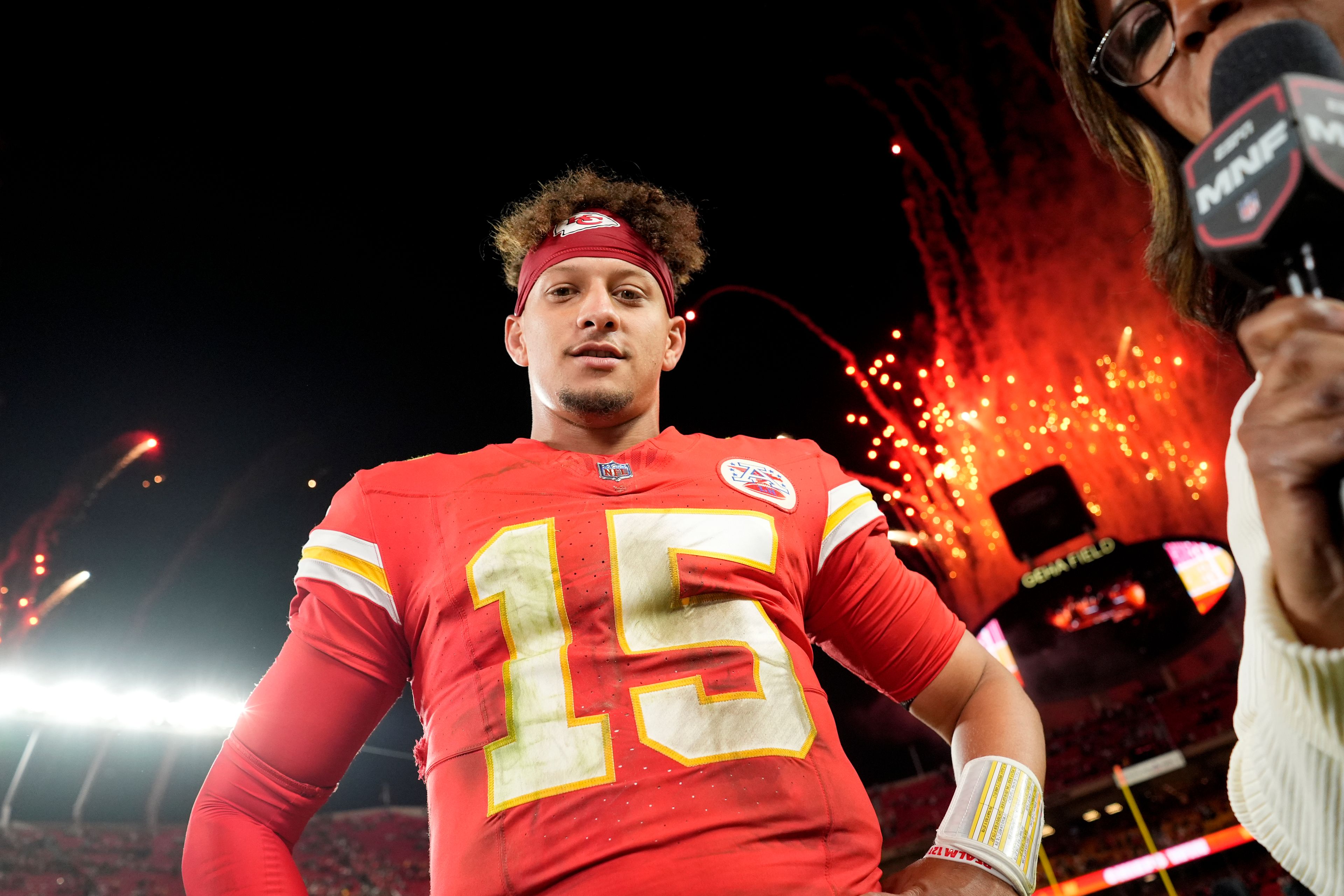 Kansas City Chiefs quarterback Patrick Mahomes waits to be interviewed following an NFL football game against the New Orleans Saints Monday, Oct. 7, 2024, in Kansas City, Mo. The Chiefs won 26-13. (AP Photo/Charlie Riedel)