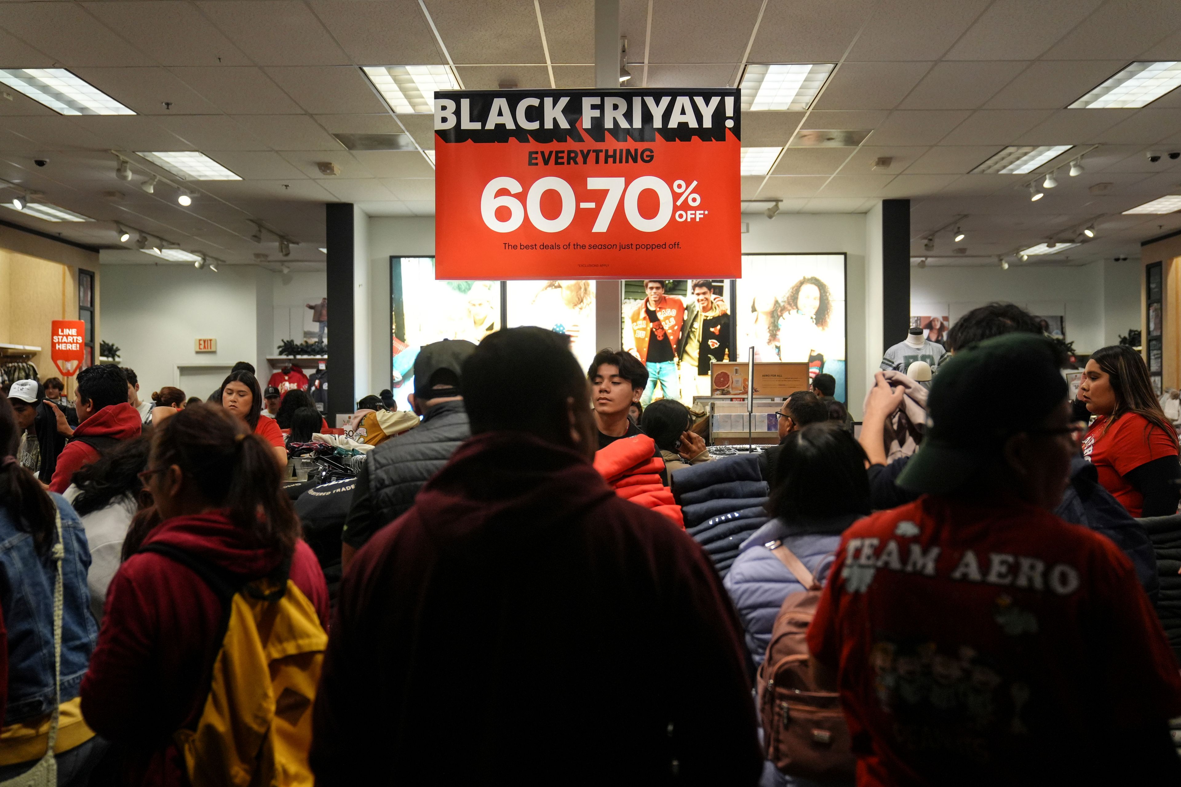 Early Black Friday shoppers browse a store at Citadel Outlets in Commerce, Calif., Thursday, Nov. 28, 2024. (AP Photo/Jae C. Hong)