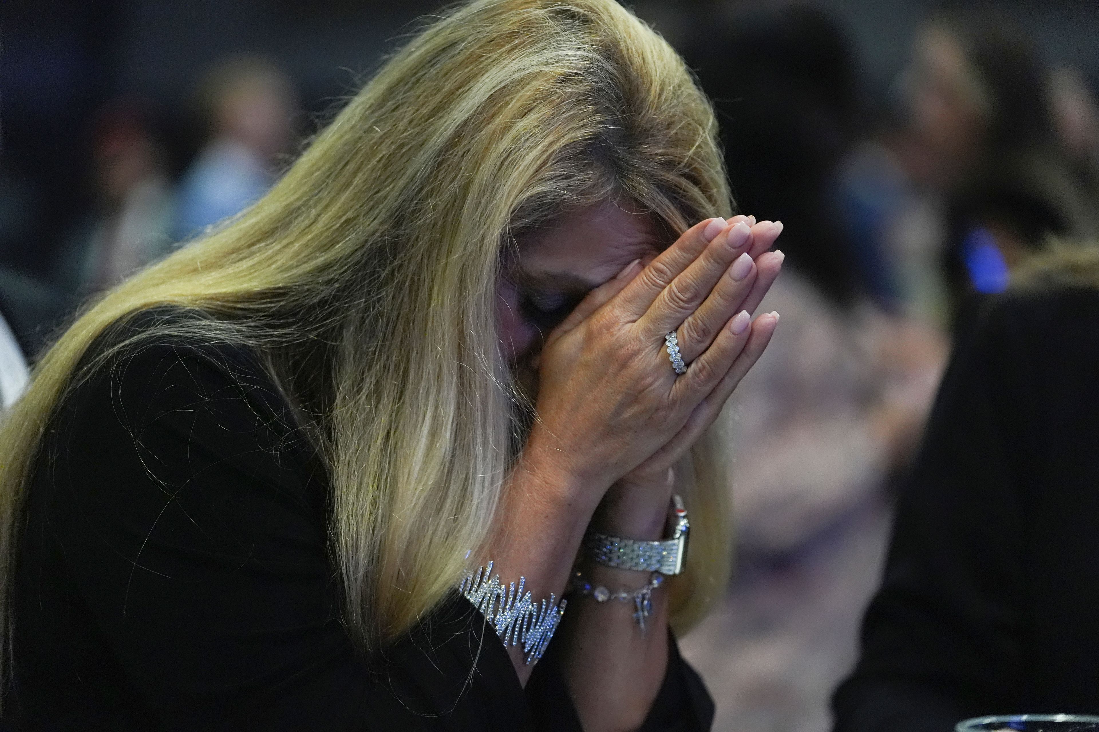 Lisa Matassa of Nashville watches results during a watch party for Republican Presidential nominee former President Donald Trump at the Palm Beach County Convention Center during an election night watch party, Tuesday, Nov. 5, 2024, in West Palm Beach, Fla. (AP Photo/Lynne Sladky)