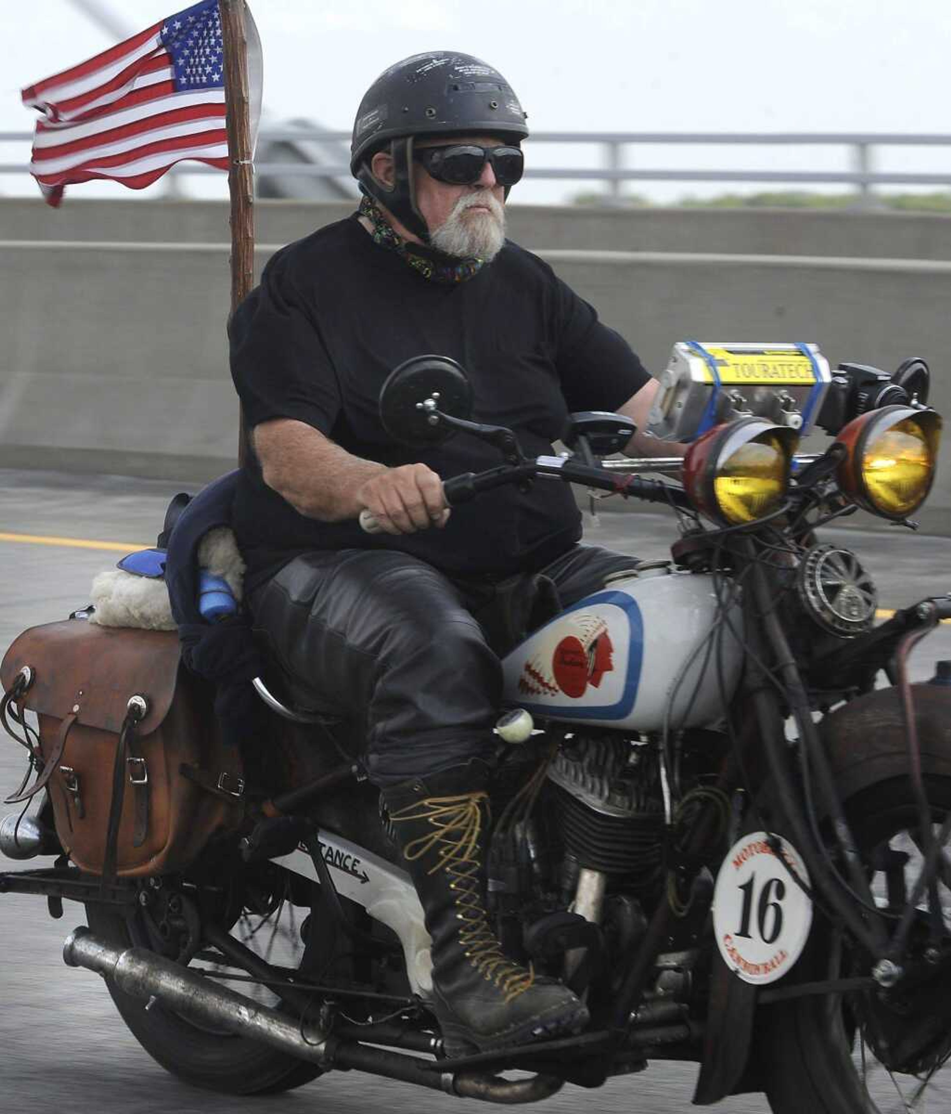 Ron Roberts of New Hampshire rides his 1936 Indian Chief across the Bill Emerson Memorial Bridge for the Motorcycle Cannonball Endurance Run on Tuesday in Cape Girardeau. (Fred Lynch)