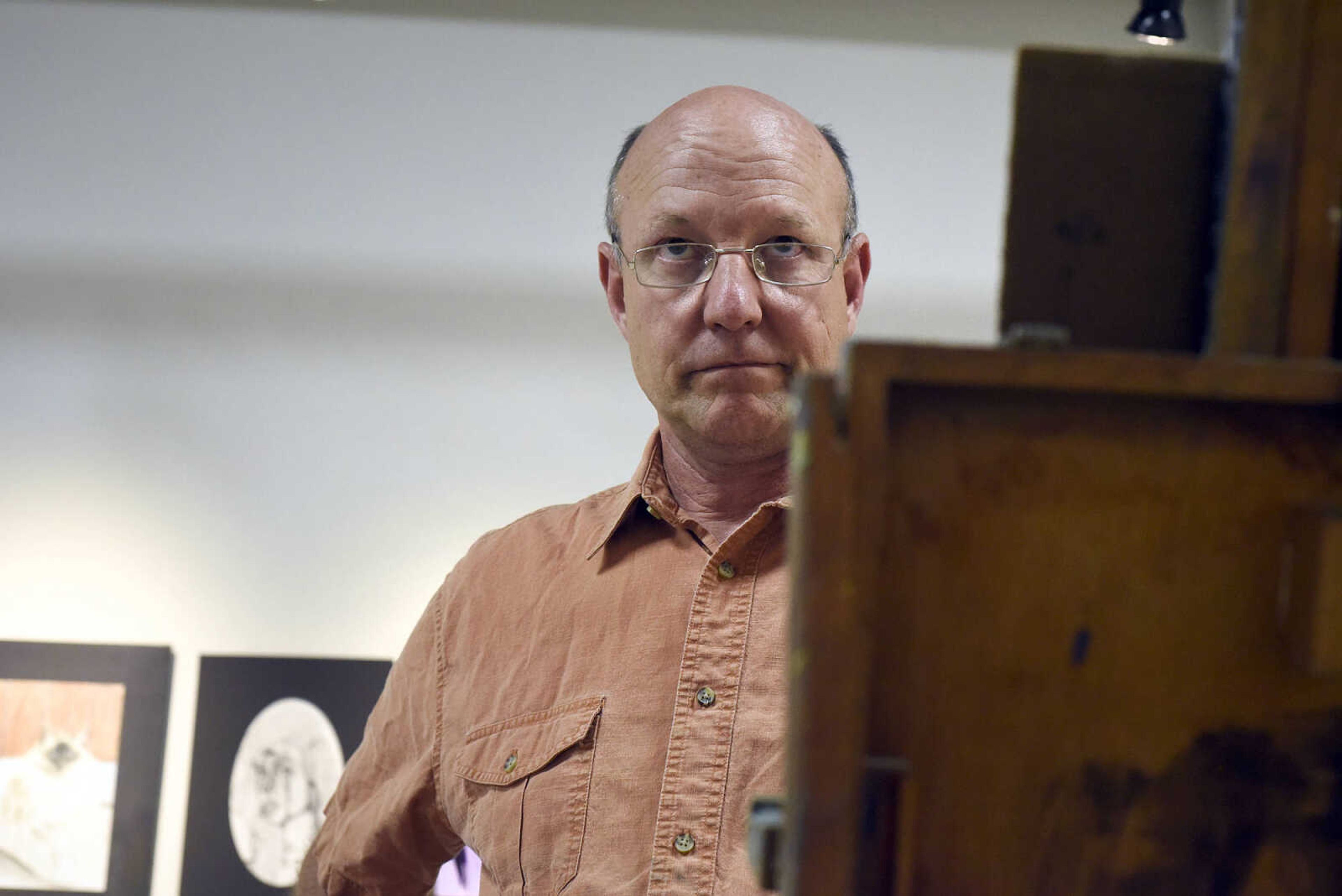 Craig Thomas looks up from his canvas during the figure drawing session on Wednesday night, May 17, 2017, at the Arts Council of Southeast Missouri in downtown Cape Girardeau.