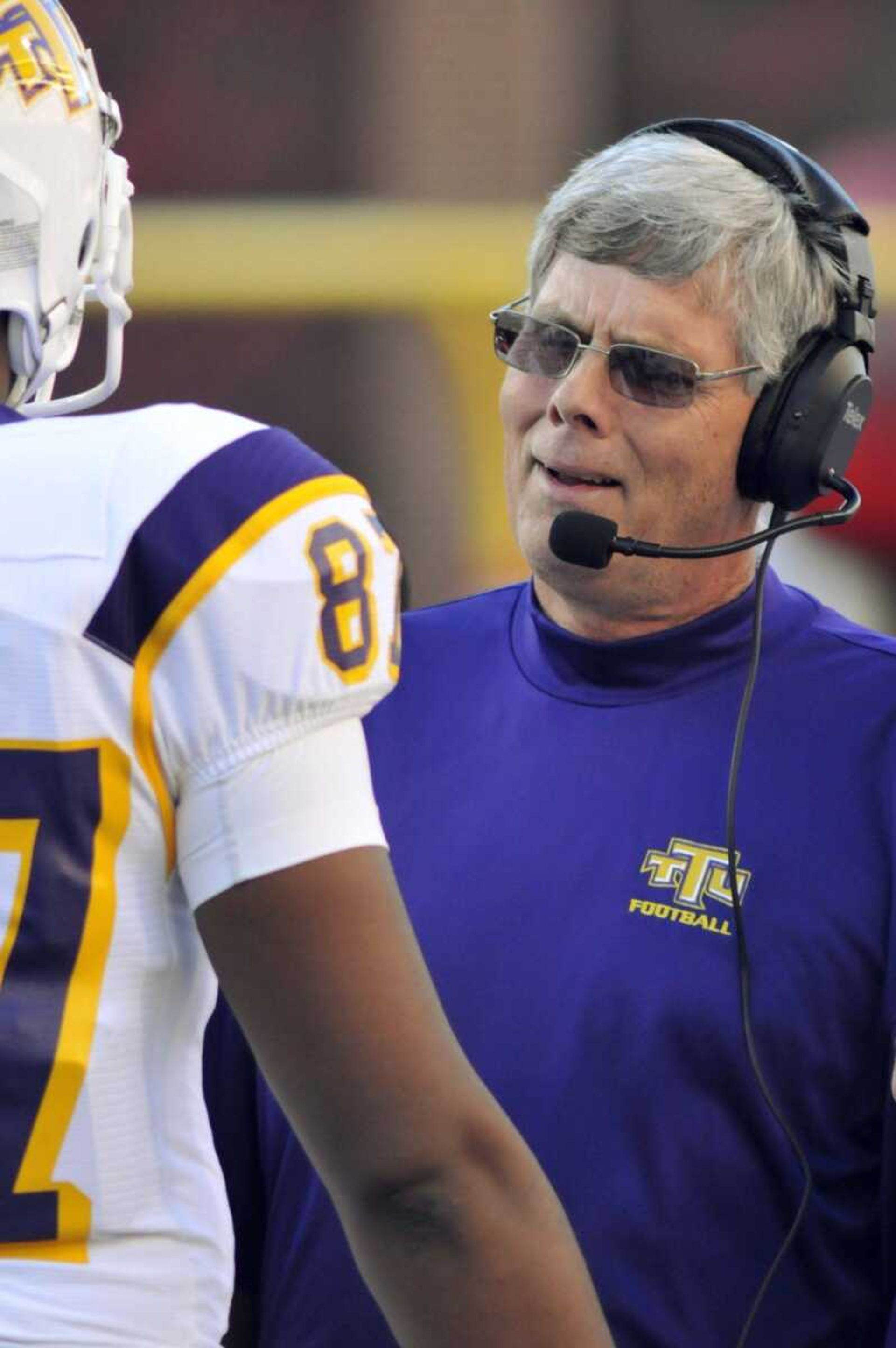 Tennessee Tech coach Watson Brown talks to tight end DaJuan Brown during the second quarter of an NCAA college football game against Arkansas in Fayetteville, Ark., Saturday, Sept. 4, 2010. (AP Photo/April L Brown)