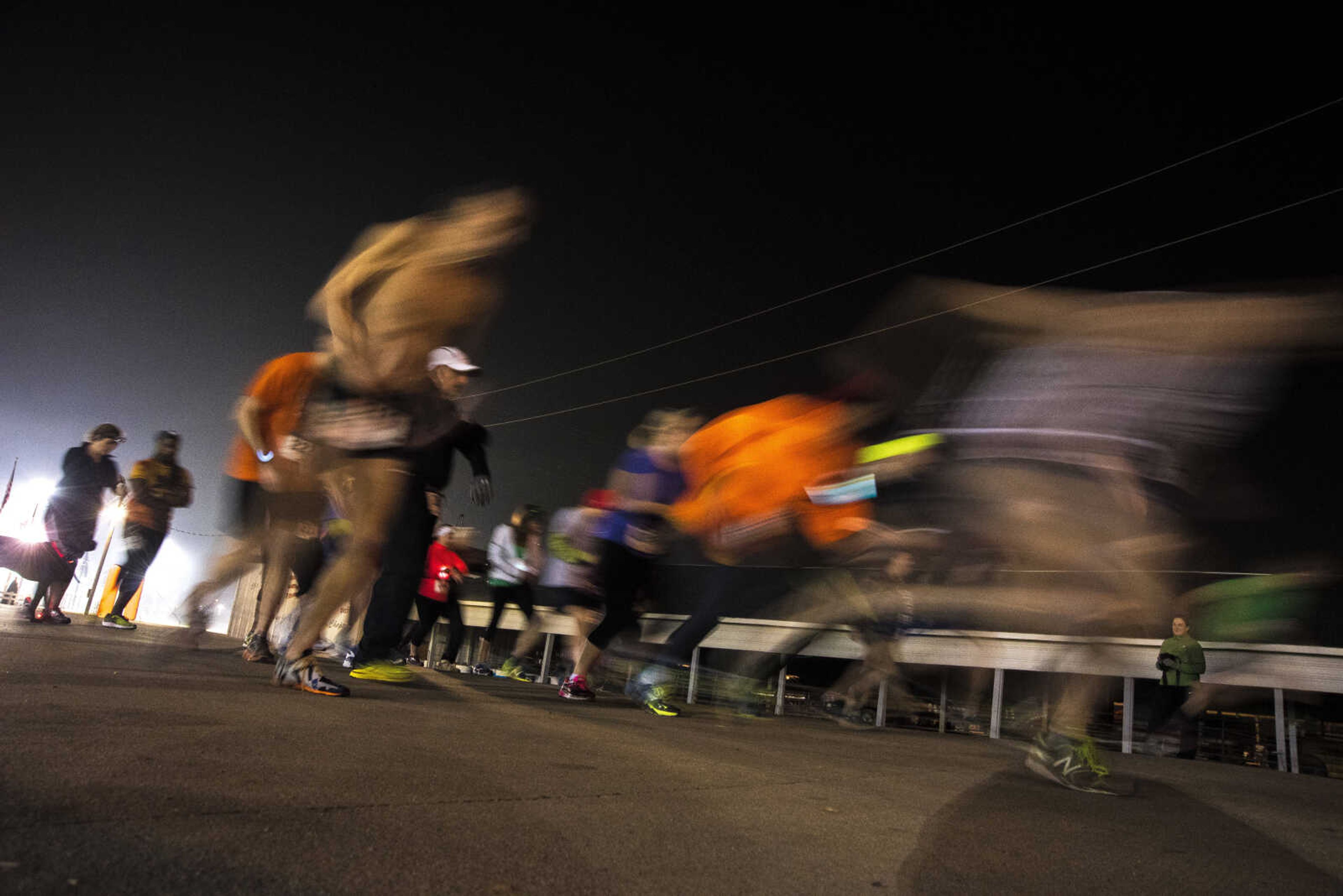 Participants compete in the midnight 5k for the 8th annual Howard Aslinger Endurance Run on Saturday, March 18, 2017 in Cape Girardeau.