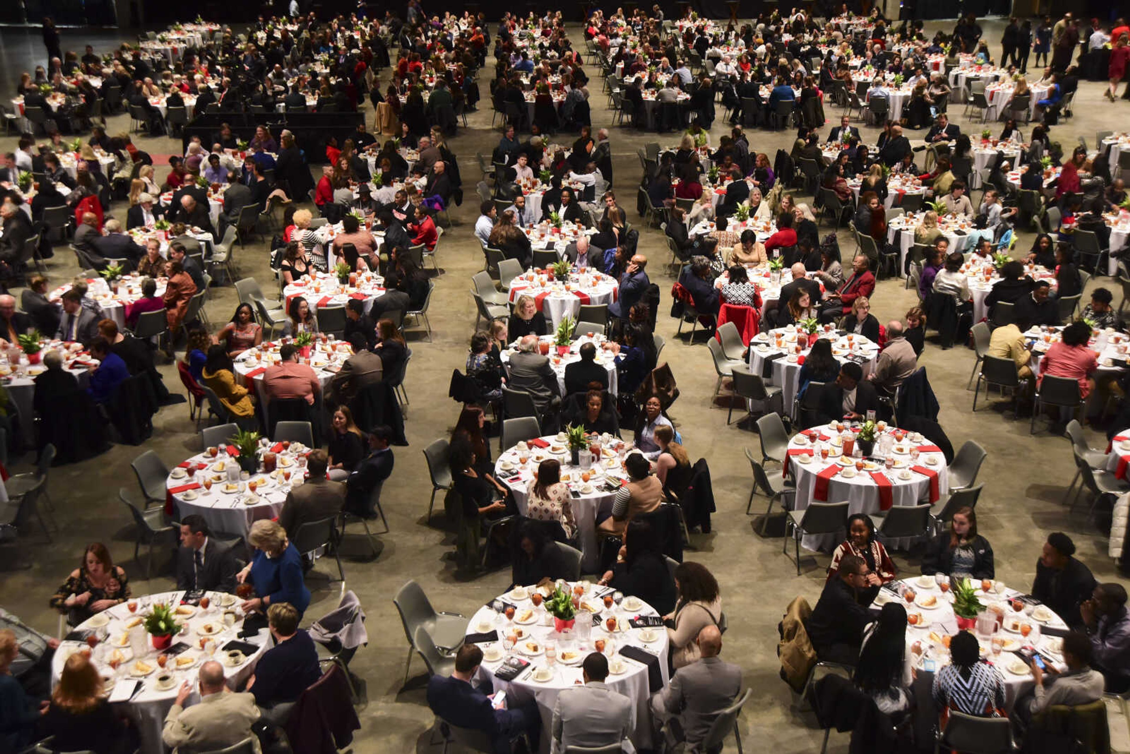 Audience members eat dinner during the Dr. Martin Luther King, Jr. Celebration Dinner Wednesday, Jan. 18, 2017 at the Show Me Center in Cape Girardeau.