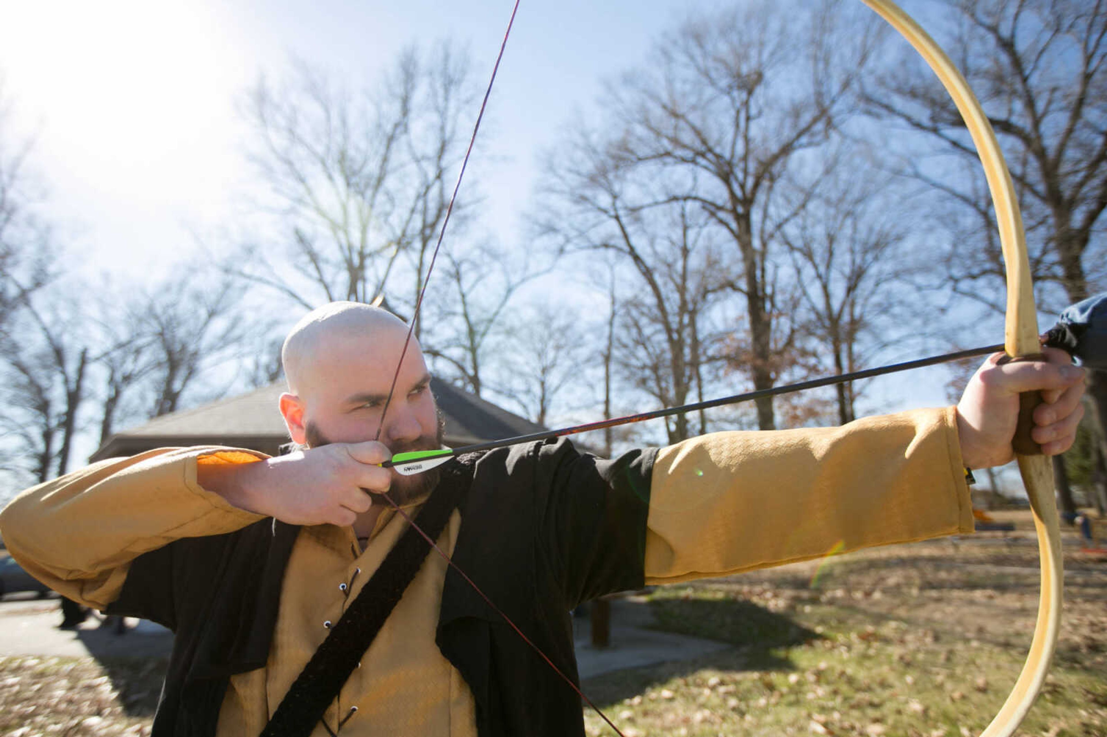 GLENN LANDBERG ~ glandberg@semissourian.com




Andrew Litzelfelner draws a boy back to fire a modified arrow during an Amtgard practice Saturday, Jan. 31, 2016 at Arena Park in Cape Girardeau.