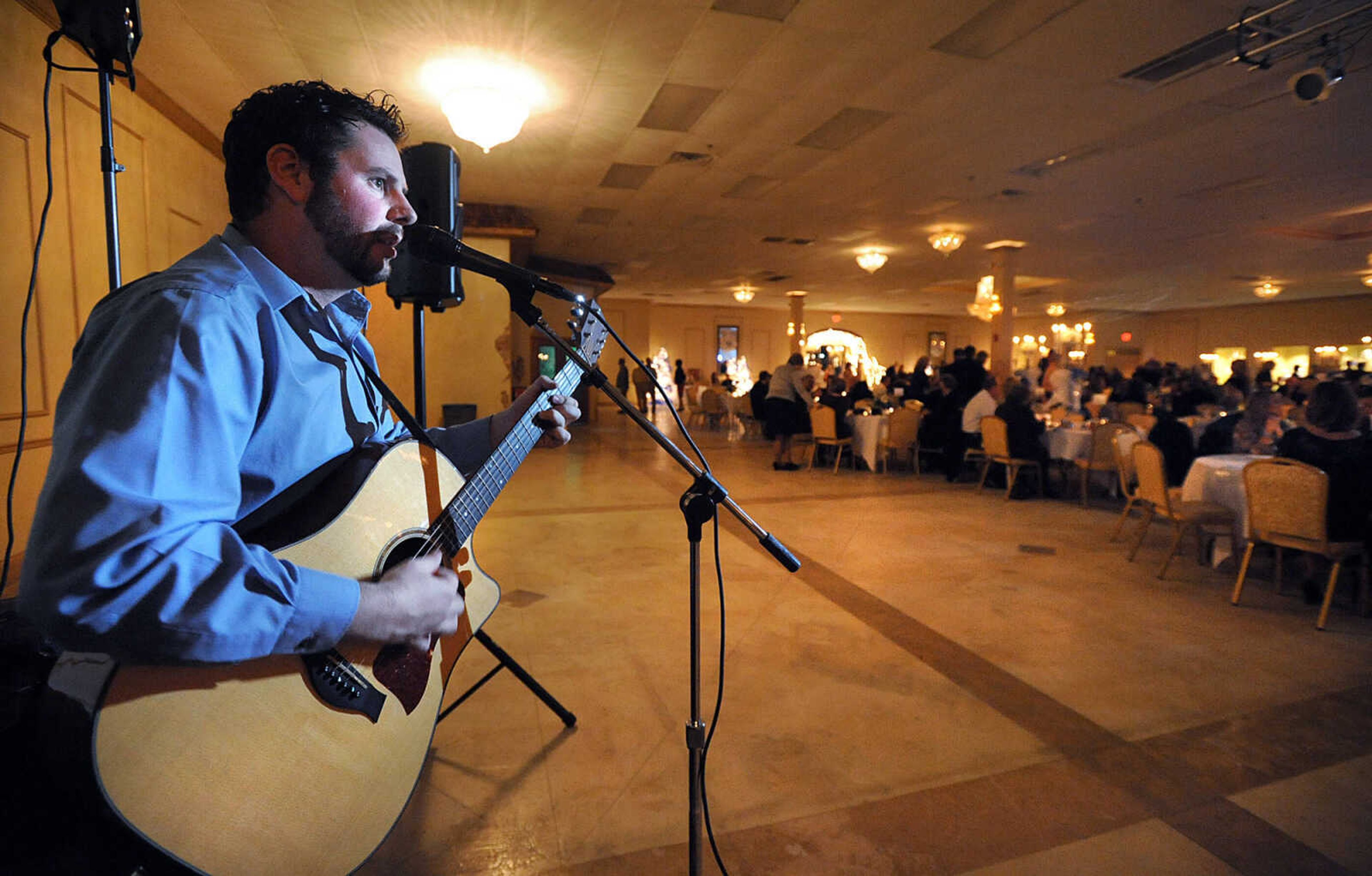 LAURA SIMON ~ lsimon@semissourian.com
Mike Renick performs Saturday night, Jan. 26, 2013 during the Notre Dame Regional High School Winter Extravaganza at The Venue.