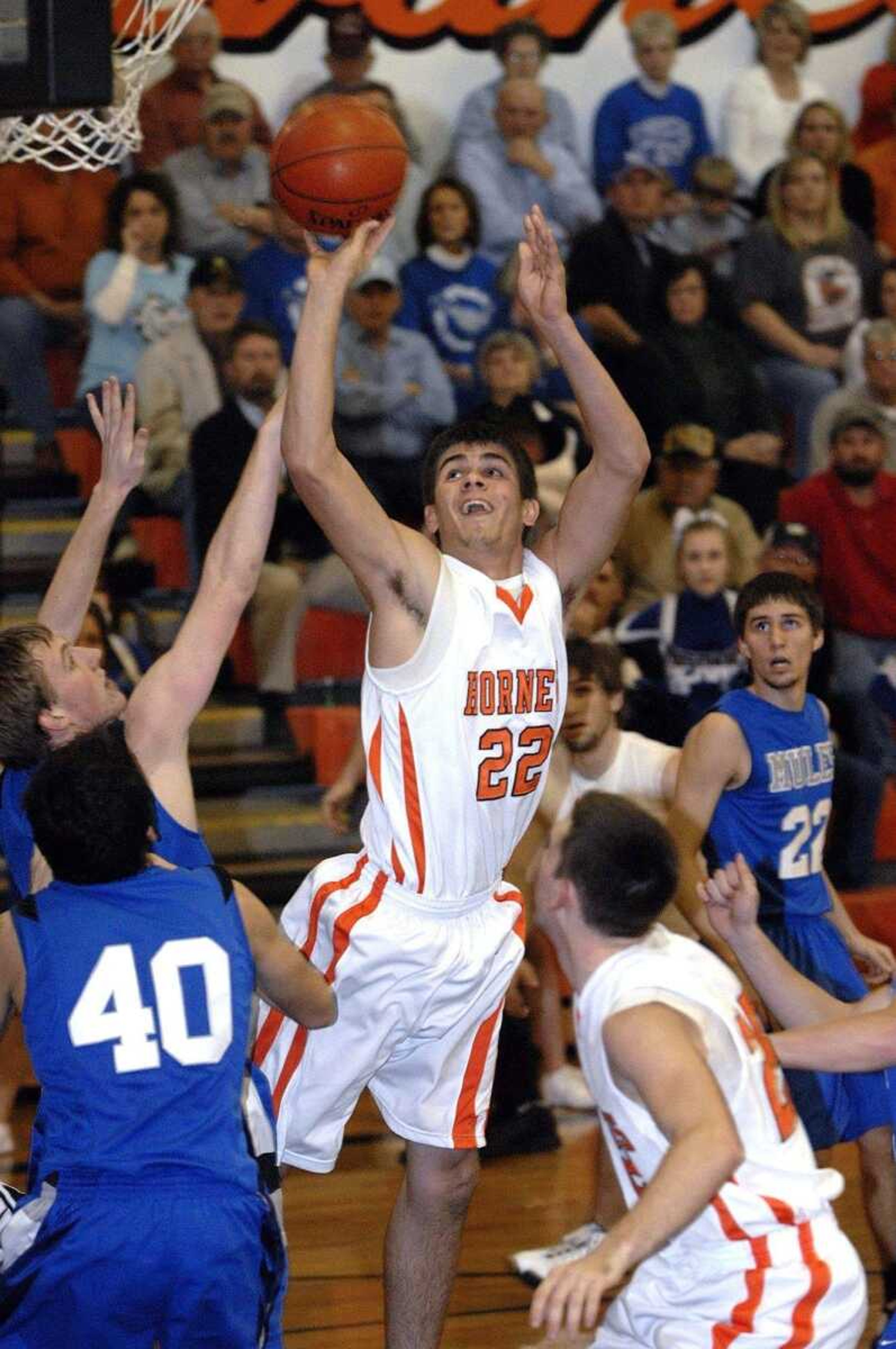 FRED LYNCH ~ flynch@semissourian.com<br>Advance's David VanGennip shoots over Bernie's Jordan McGowan during the first quarter Friday at Advance. A photo gallery from the game is available at semissourian.com.