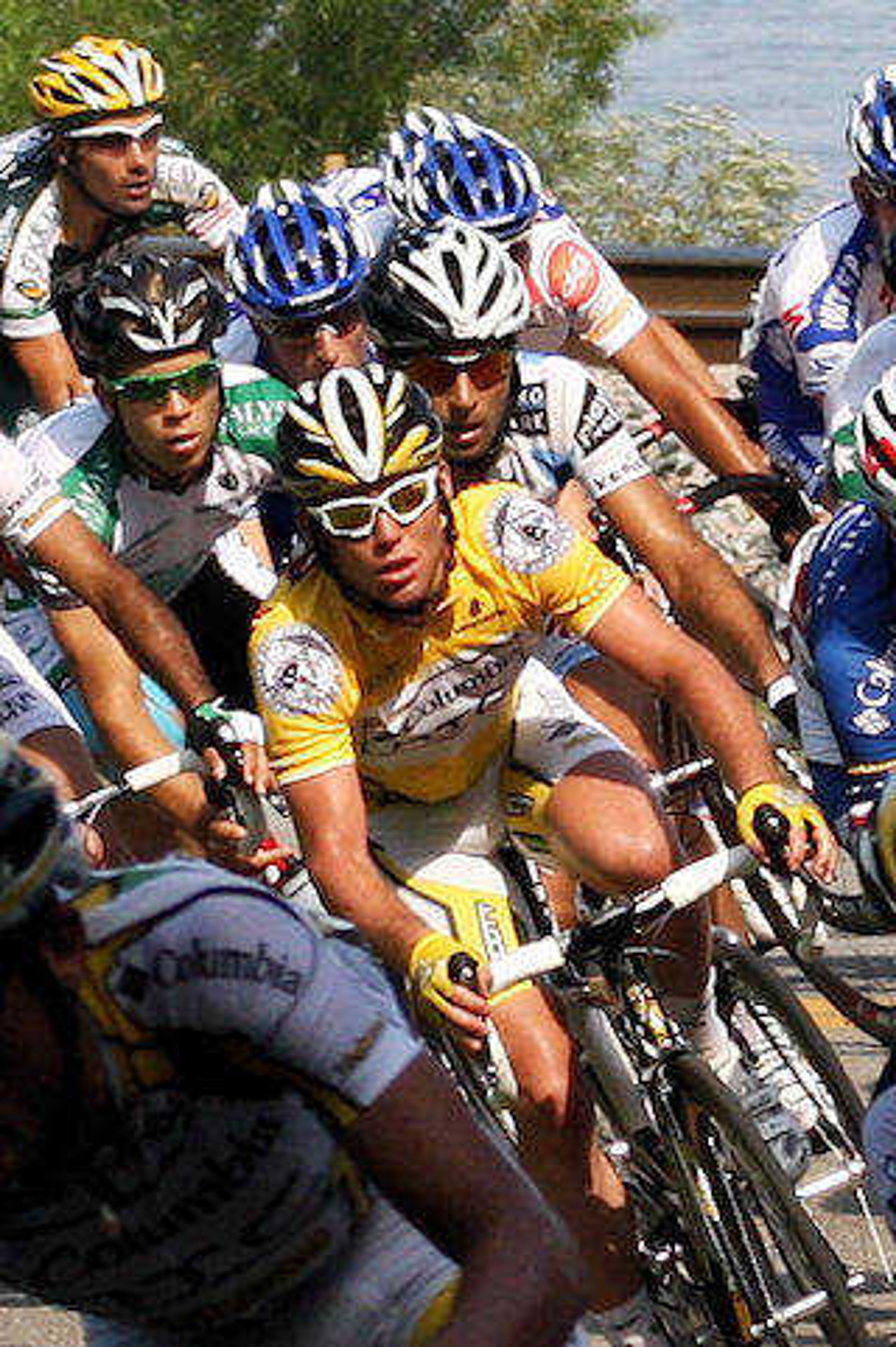 Cavendish, with members of his team leading him, gets ready to climb the Cape Rock hill.