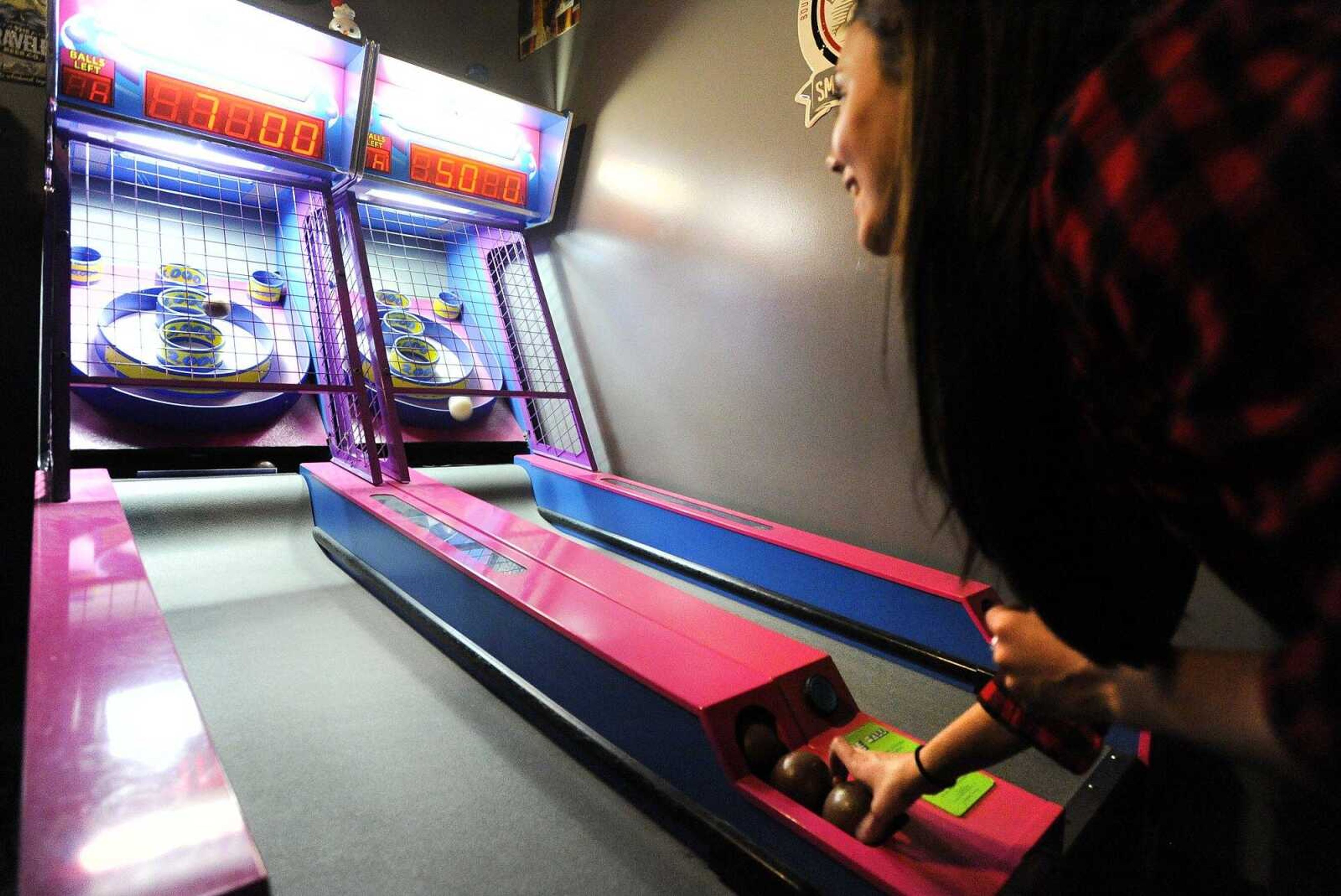 A patron plays skee-ball at Coin Op Cantina in downtown Cape Girardeau. (Laura Simon)