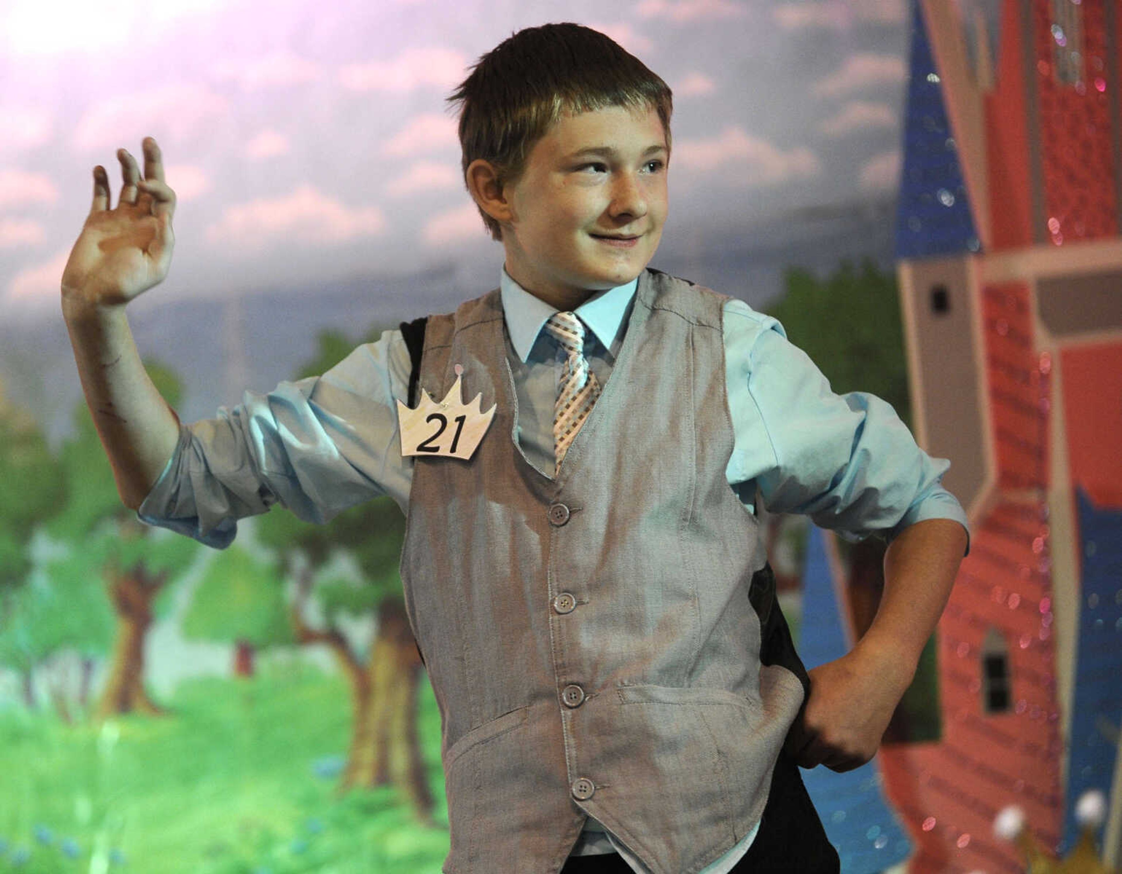 Kyle Williams strikes a pose in the 10-14 age division of the S. E. Missouri Angels Pageant on Saturday, April 26, 2014 at Scott City High School.