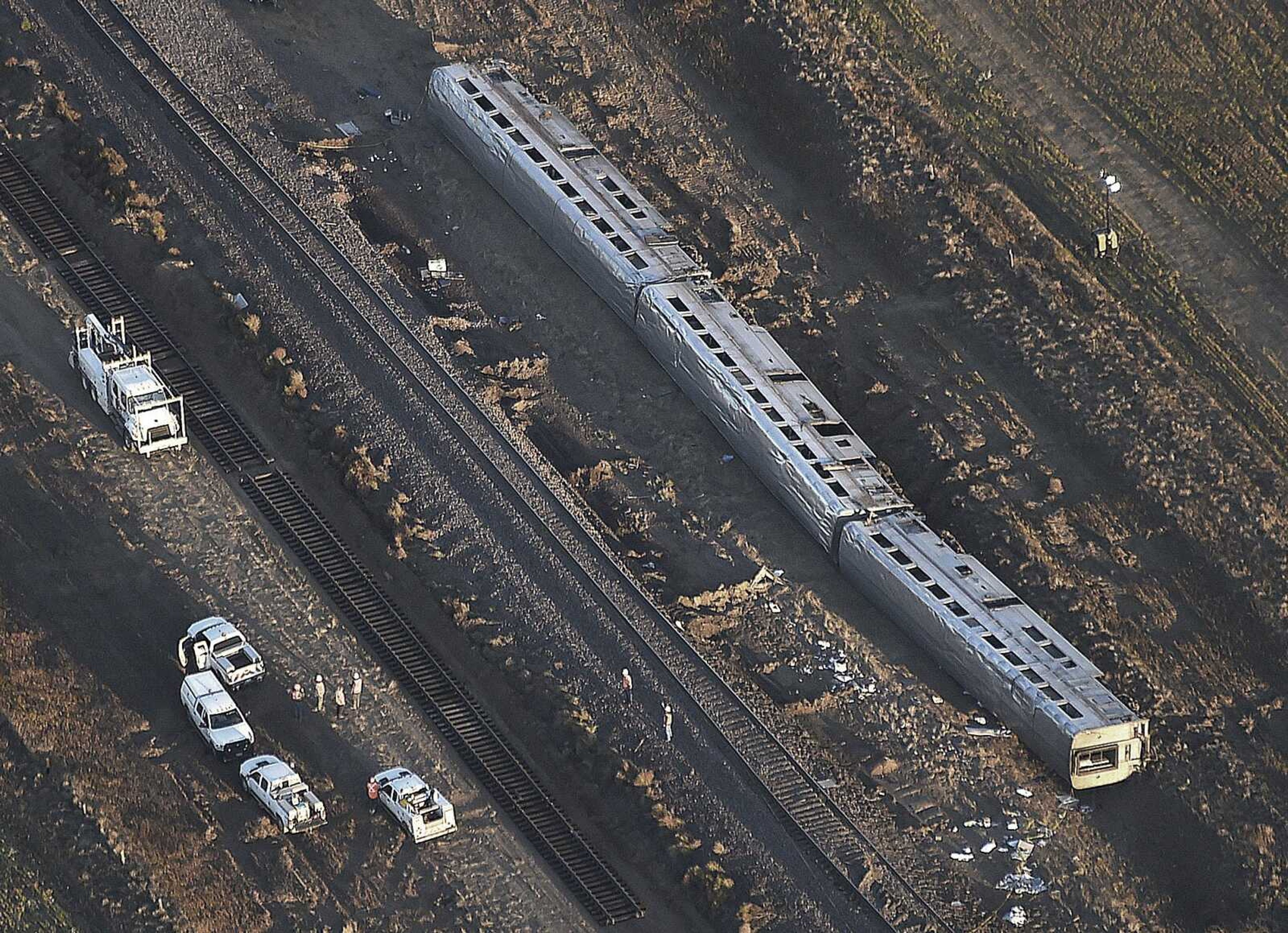 This aerial view taken Sunday shows part of an Amtrak train that derailed in north-central Montana on Saturday that killed multiple people and left others hospitalized, officials said.