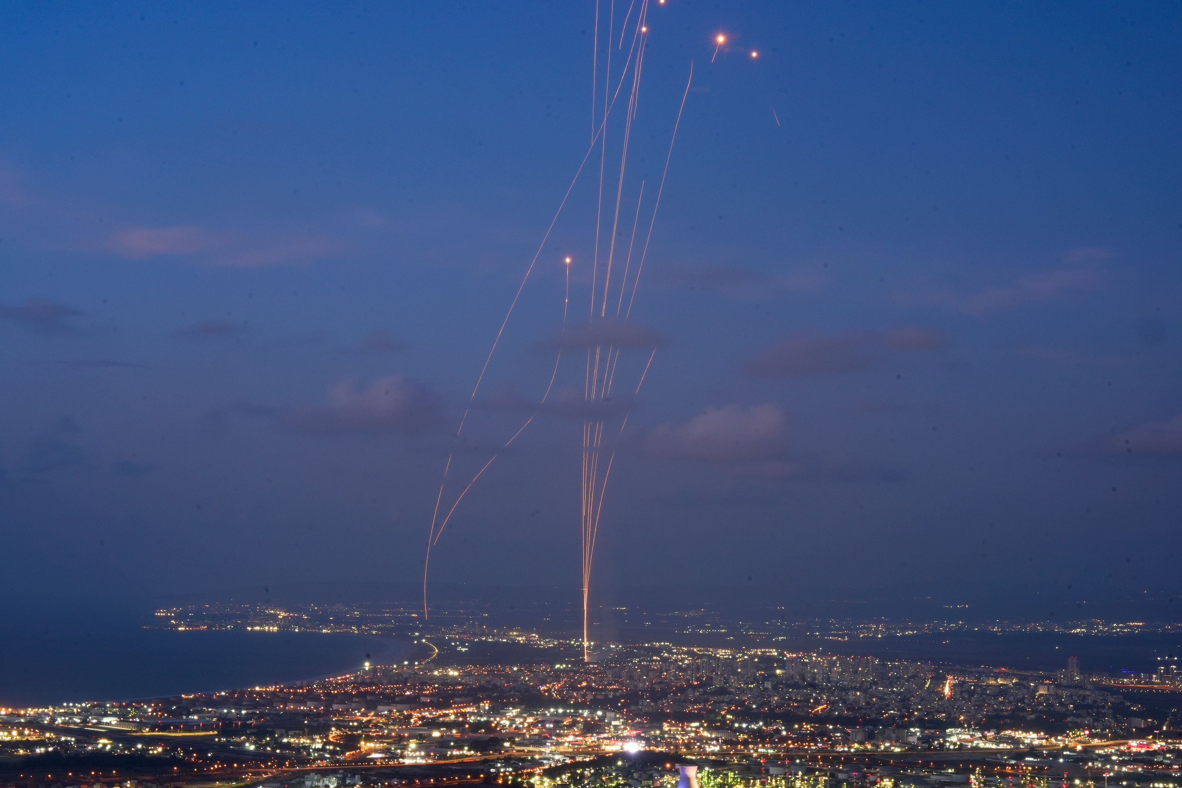 Israeli Iron Dome air defense system fires to intercept rockets that were launched from Lebanon, as seen from Haifa, northern Israel, Monday, Sept. 23, 2024. (AP Photo/Baz Ratner)