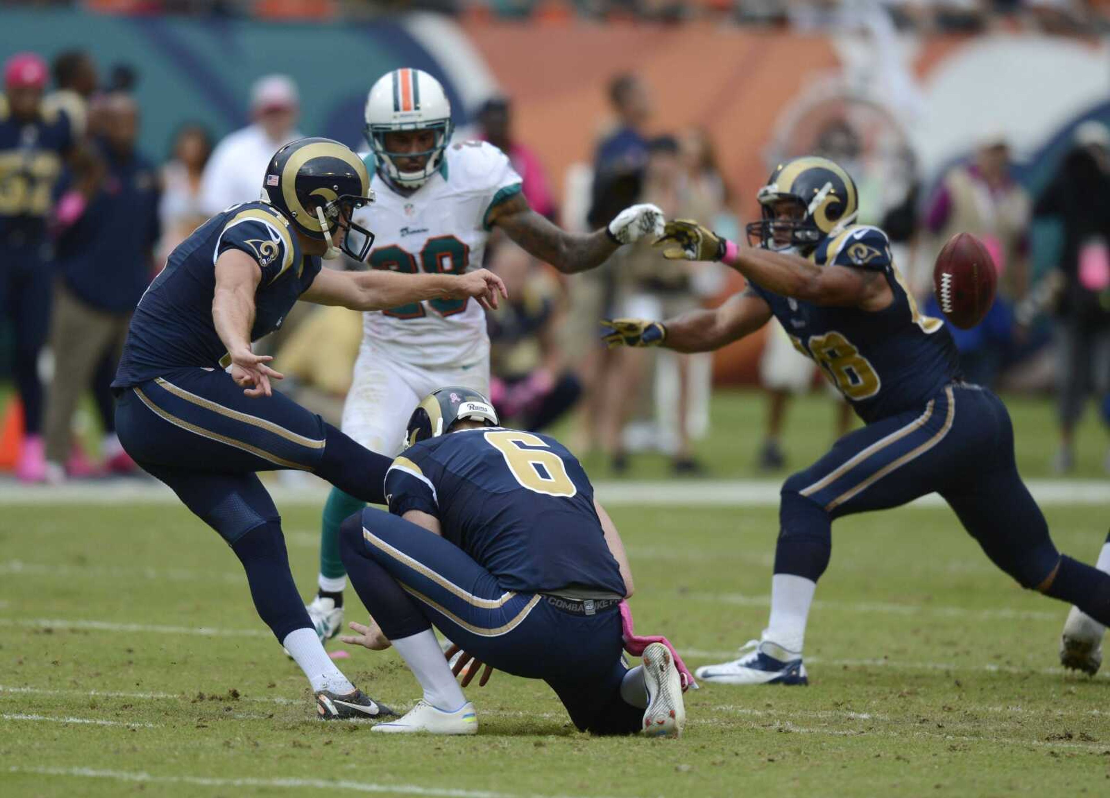 Rams kicker Greg Zuerlein attempts a 66-yard field goal in the final seconds of Sunday&#8217;s game against the Dolphins in Miami. Zuerlein missed the attempt and St. Louis lost 17-14.