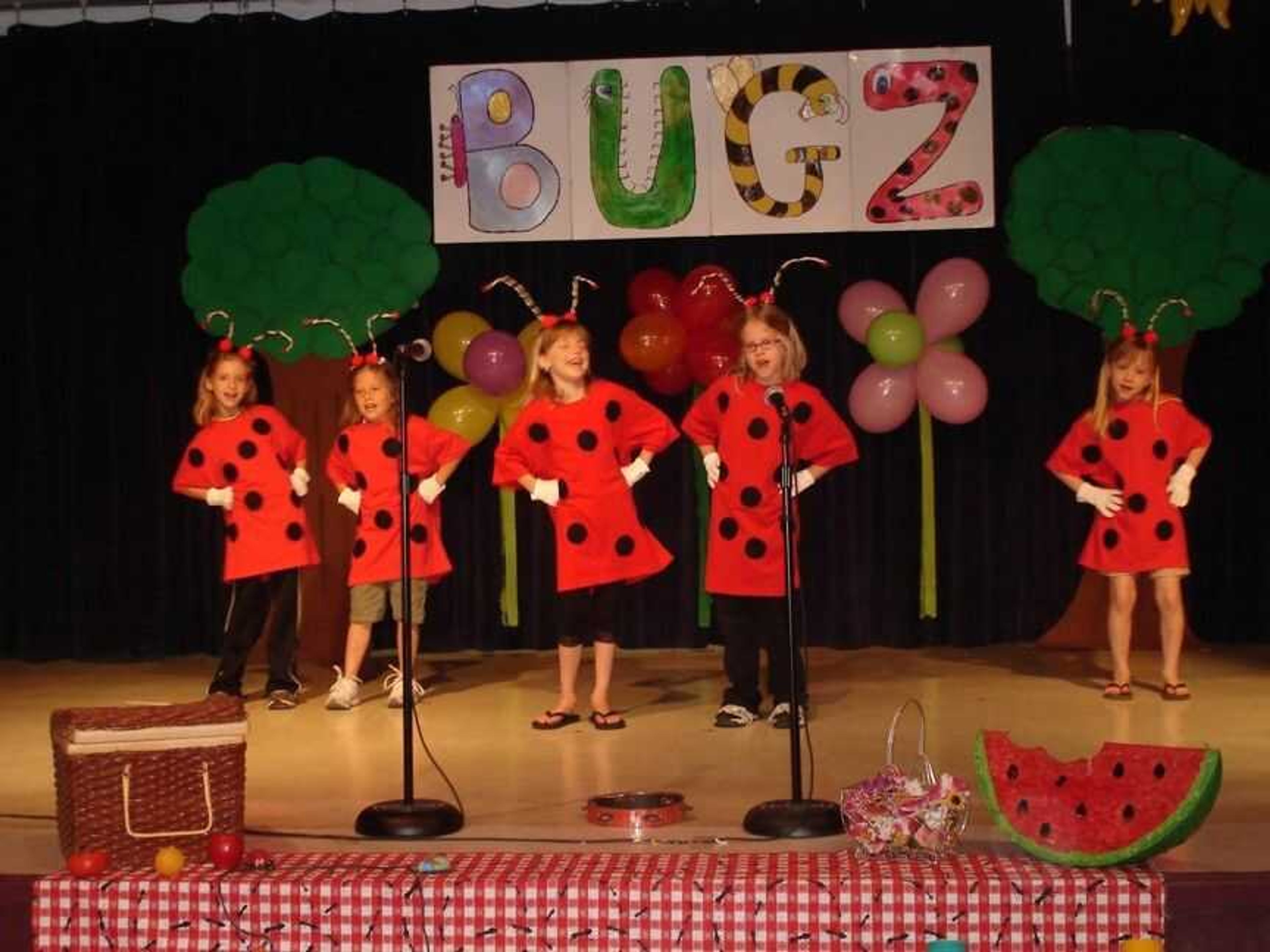 The lady bugs take center stage during the musical production of "BUGZ." They are: (from left) Leah Buerck, Brittanie Stewart, Chloe Anshultz, MaKayla Monier and Harlee Edwards- Maples.

(Photo by L. Boxdorfer, Perry County School Dist. No. 32)